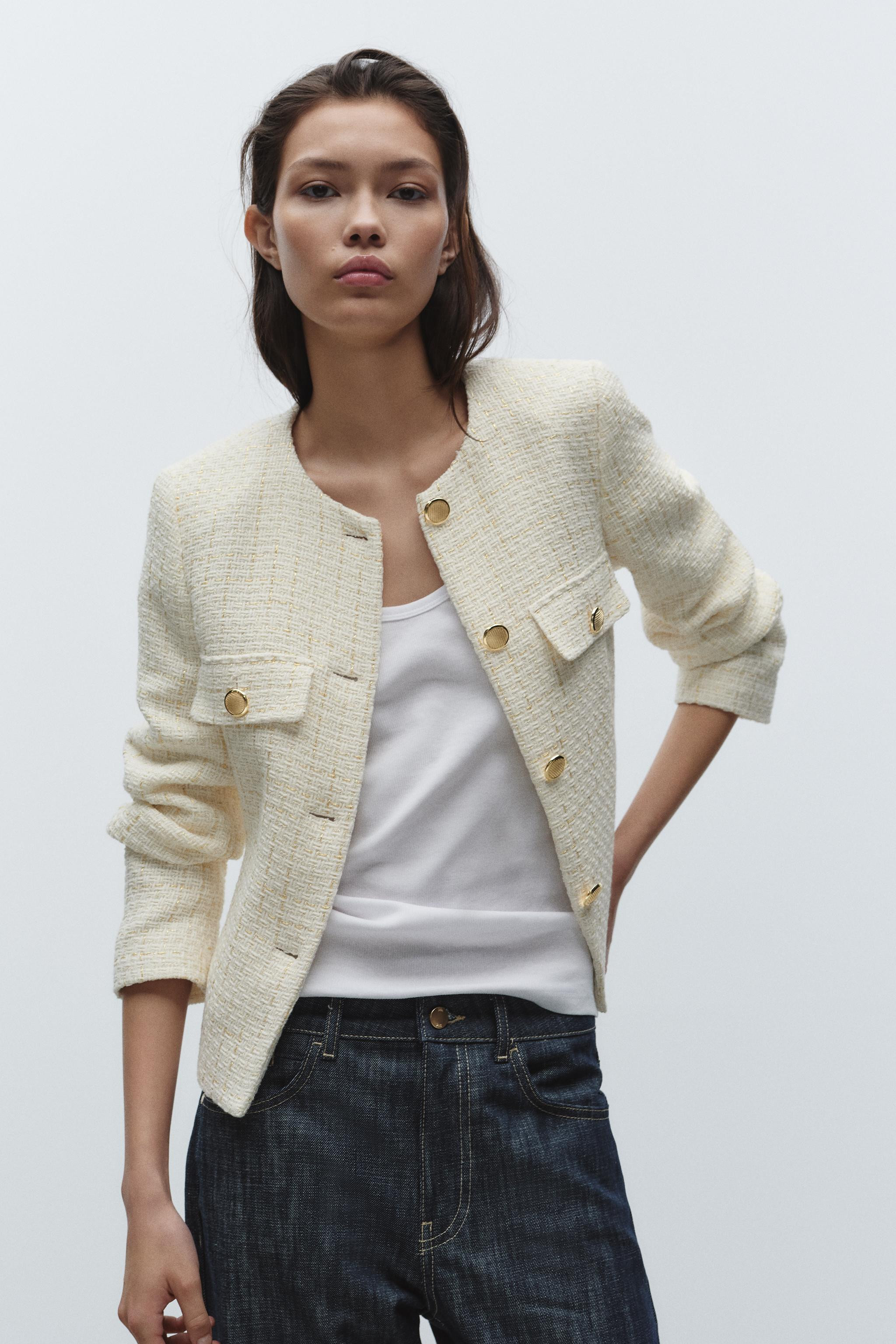 Round neck, long sleeve blazer with shoulder pads. Featuring a matching lined belt and front flap... | Zara UK