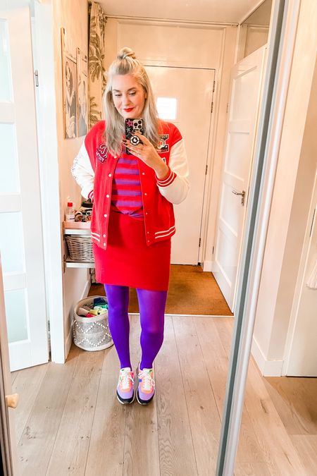 Ootd - Thursday. Feeling a bit under the weather so wore bright colors to lift my spirits. Varsity jacket is old H&M (M), red and purple striped t-shirt is from Italian store Piombo, red skirt is from Zara, purple tights are from Snag. Brightly colored Puma sneakers. 

#LTKstyletip #LTKover40 #LTKMostLoved
