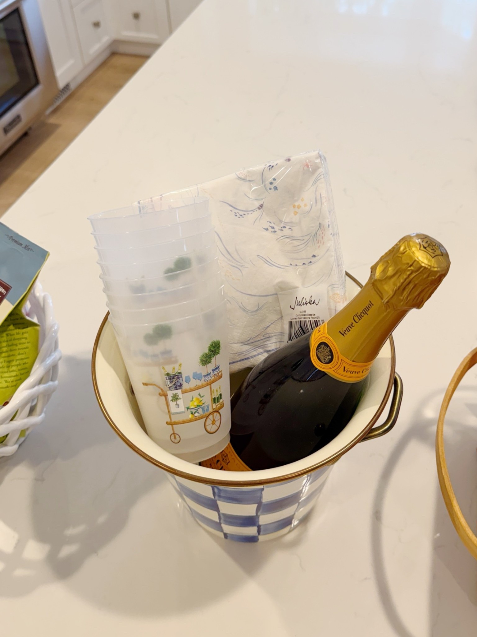 Great summer gift to give someone who
is celebrating something special! Pair a bottle of champagne with an ice bucket, reusable cups and some napkins!