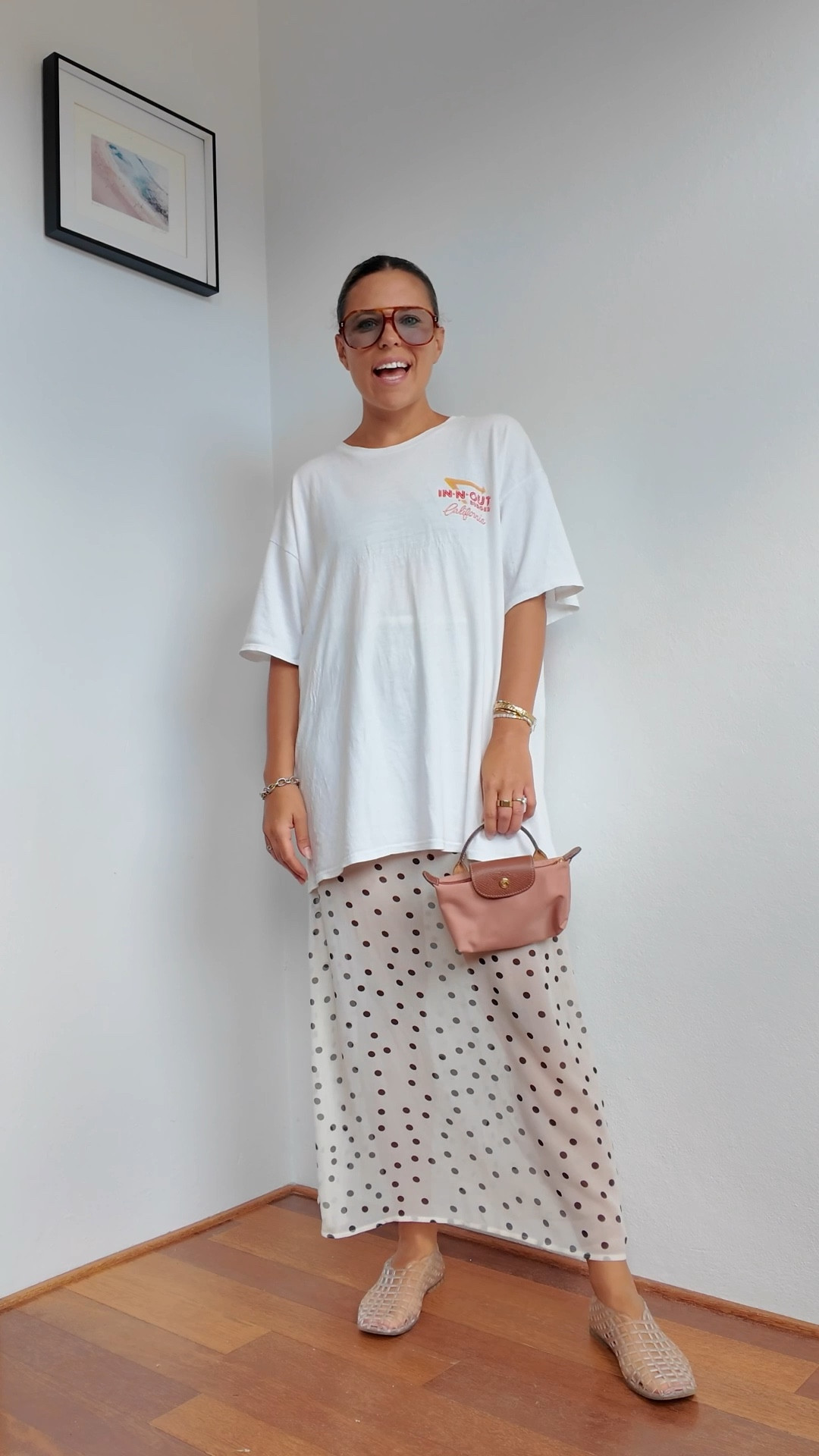 Borrowed my husbands tee! 

Wearing BAULUS sunglasses.

-
Outfit ideas. Polka dot skirt. Oversized tee. Oversized Sunglasses.

#LTKaustralia