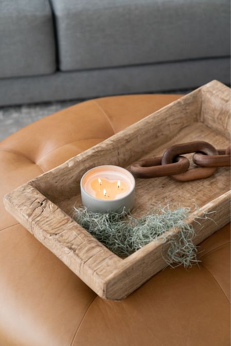 Living room ottoman with wooden tray, Spanish moss, candle and wood chain. 

Home decor, interior design, rug, table styling. 

#LTKhome #LTKunder100 #LTKunder50