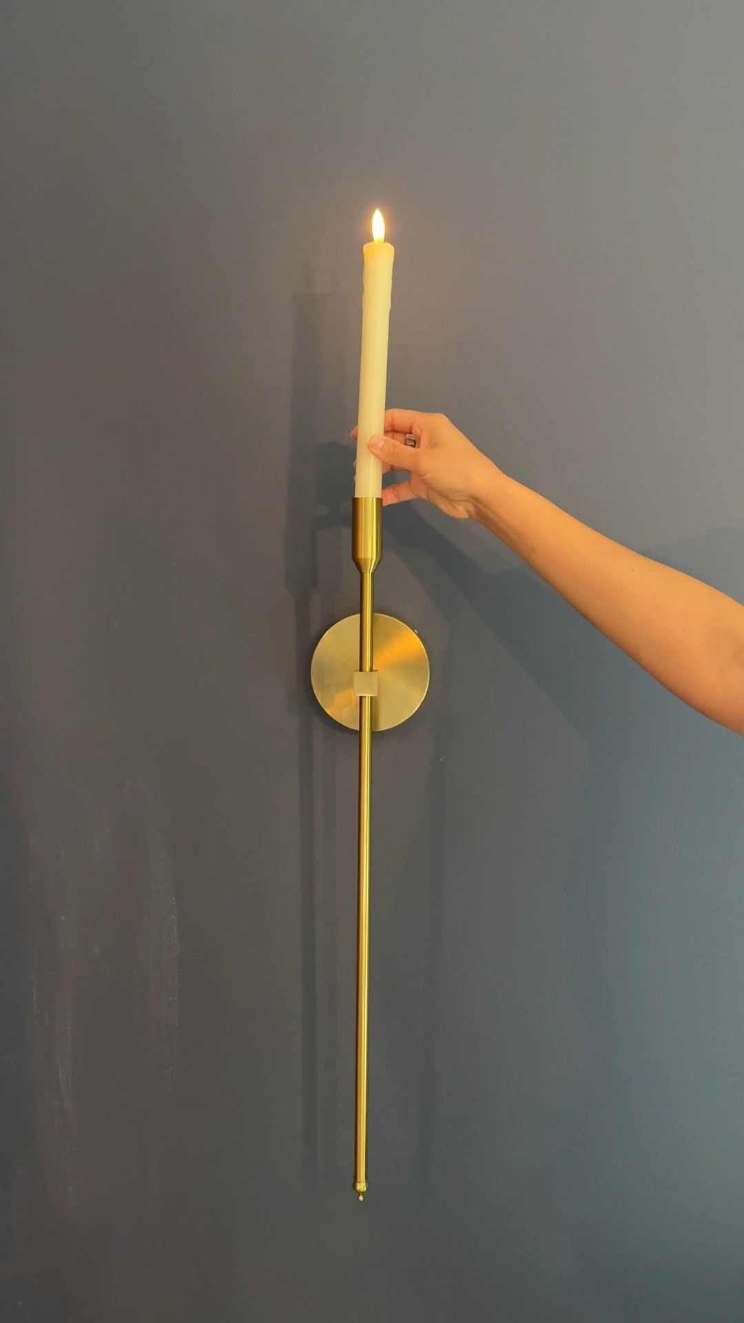These brass candle sconces and flameless candles realllyyy make our kitchen look extra cozy! 

#LTKHome