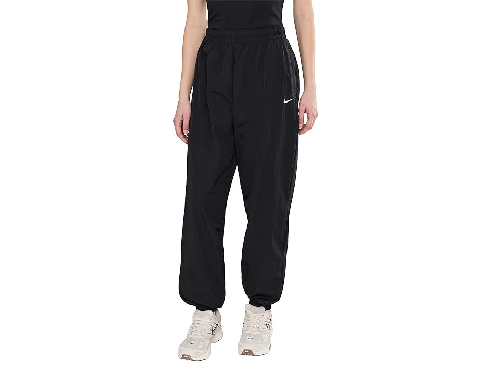 Nike Sportswear Essential Mid-Rise Oversized Woven Joggers Women's Clothing Black/White : XL (US 16-18), Mesh/Nylon/Polyester | Zappos