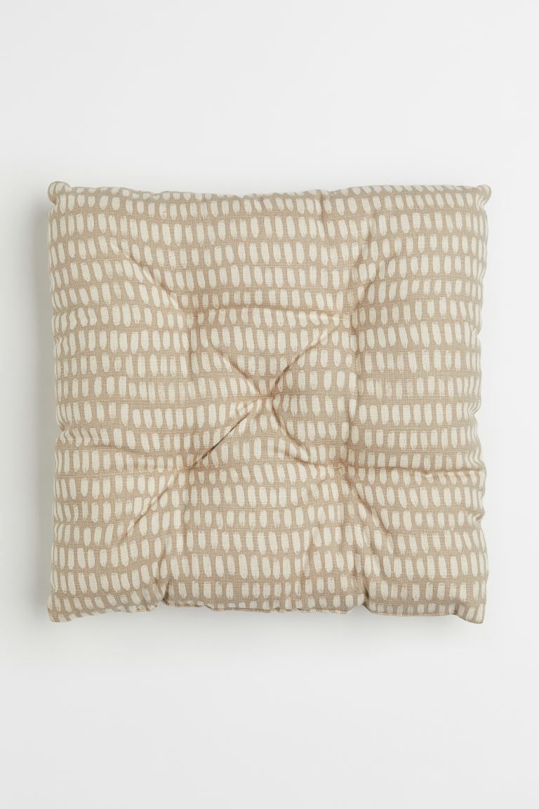 New ArrivalPadded seat cushion in woven cotton fabric with a printed pattern at both sides. Tufti... | H&M (US)