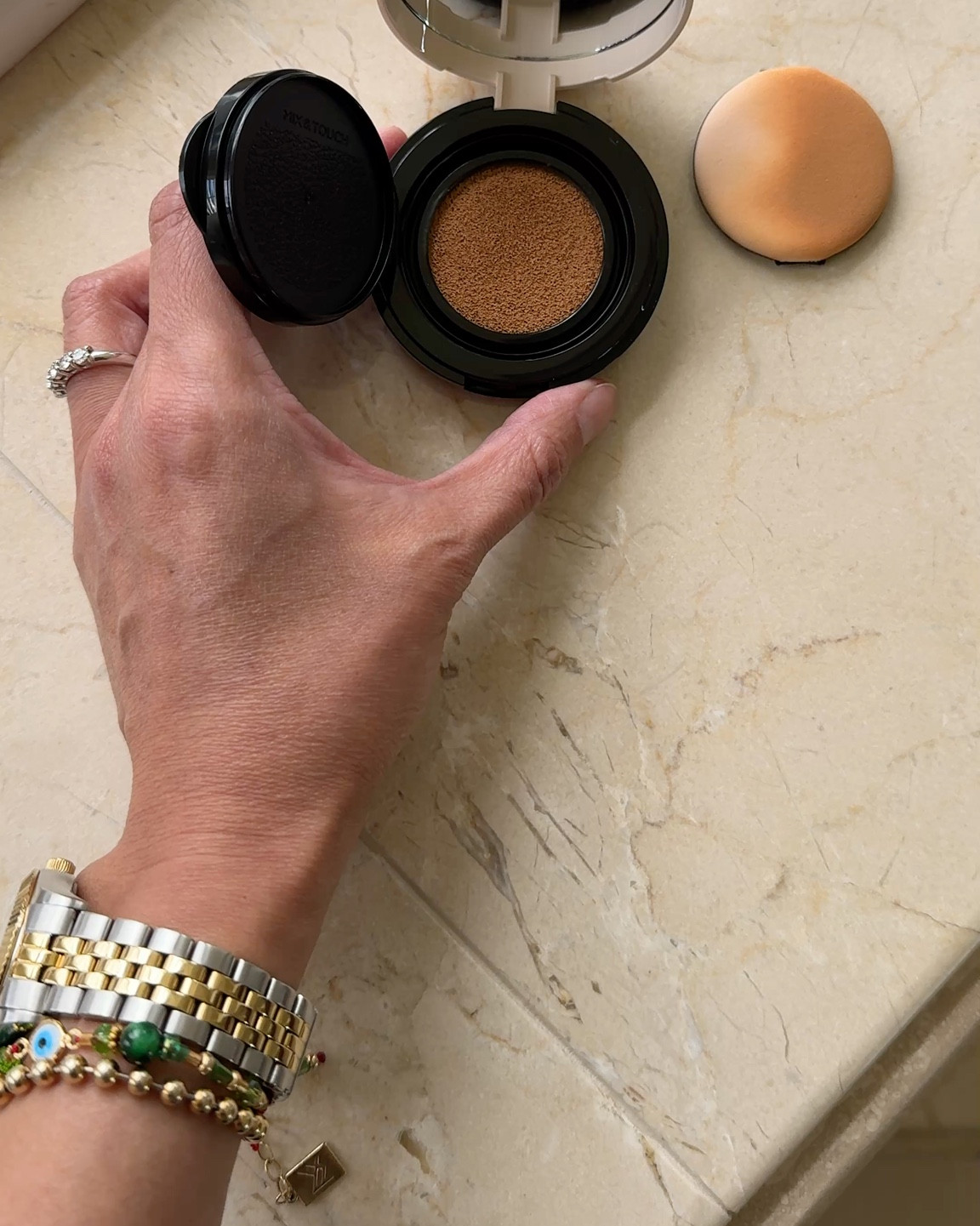 New beauty product that I’m trying out. Cushion foundation formula that is lightweight and leaves a natural looking radiance to your complexion. Skin looks healthy and glowy. It also has a slight noticeable blurring effect. Feels weightless on face. 
This is the mini size; I wanted to test it out first before committing to the full size. 
I think I need a shade lighter ideally. 
Kbeauty. 


#LTKOver40 #LTKBeauty #LTKFindsUnder50