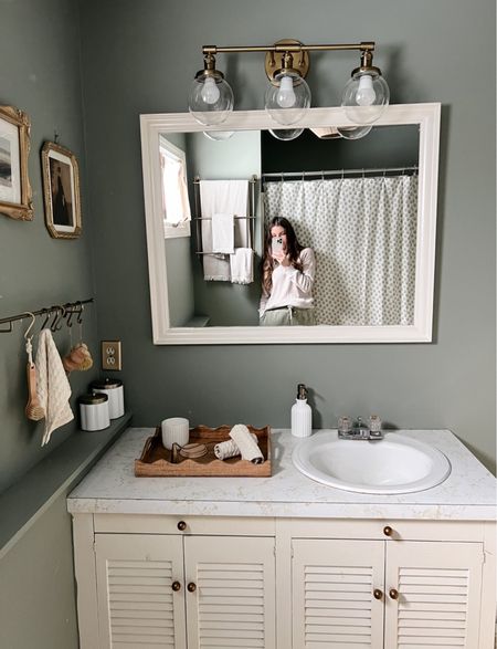 Mini bathroom makeover to hold us over before we renovate! 

#LTKhome