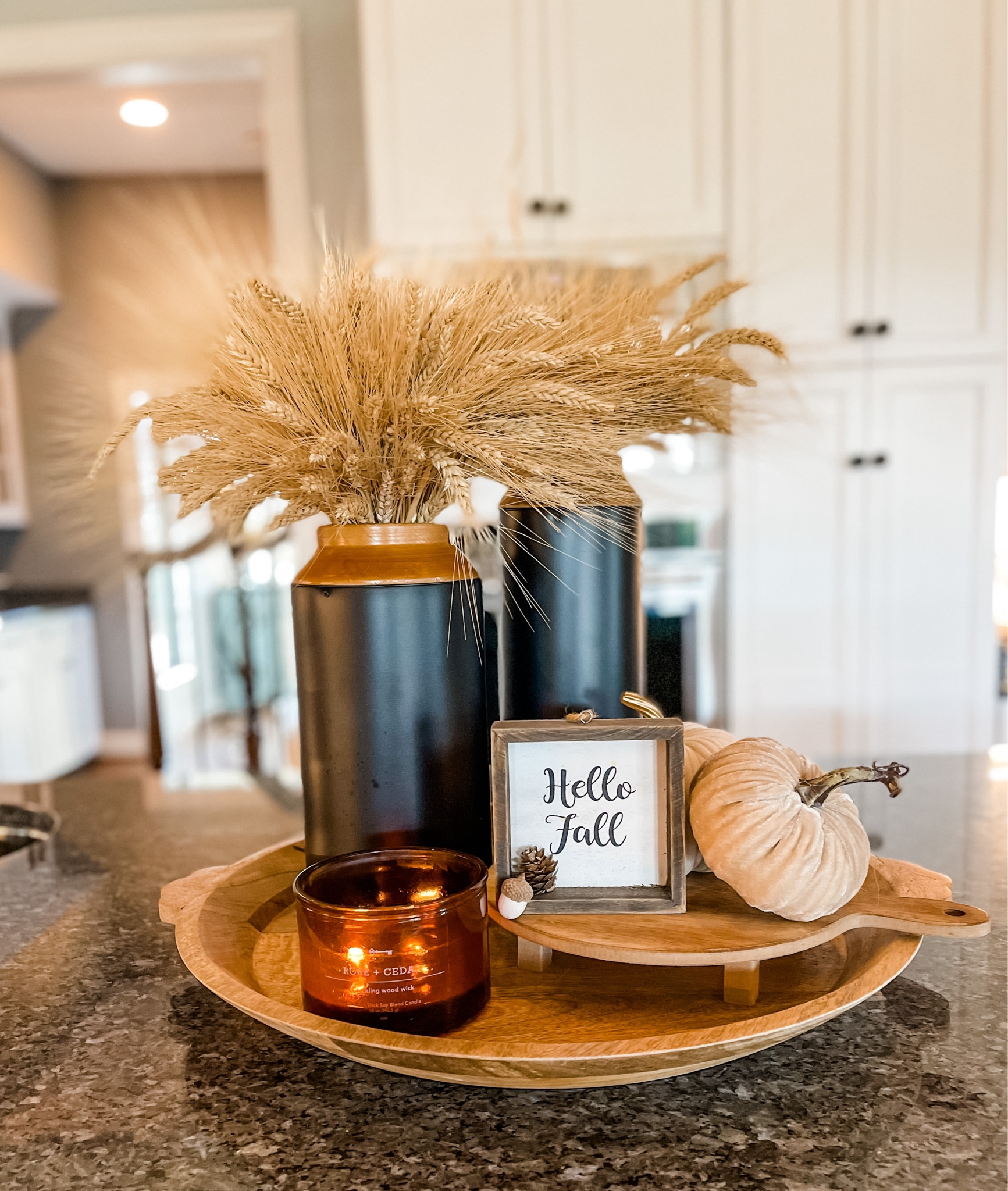 Easy beautiful Target kitchen island styling! Add cozy vibes with wood tones and fall stems plus texture and a delicious scented candle.

#LTKSeasonal #LTKhome #LTKunder50