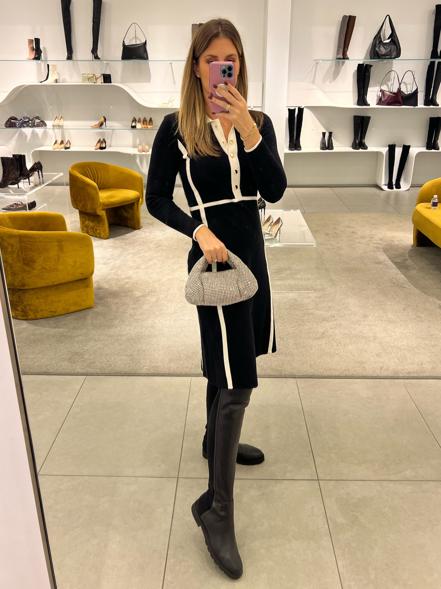 This black and white sweater dress is classic and oh so comfy. Dressing it up with these iconic over the knee boots and a sparkly clutch (which is on sale and comes in lots of colors!) It’s the perfect evening bag for all your formal wear or even date night!

Dress runs TTS. Boots run large. Size down.

#LTKItBag #LTKStyleTip #LTKOver40
