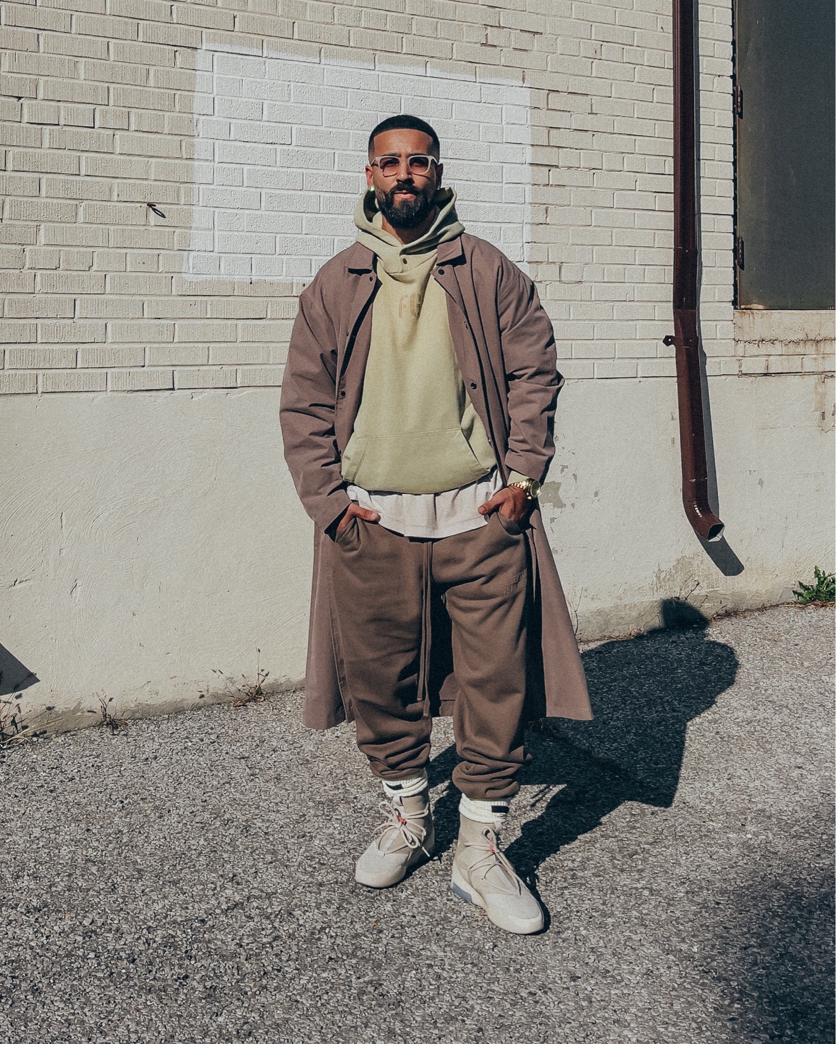 ESSENTIALS Long Coat in ‘Wood’ (size M) and Sweatpants in ‘Wood’ (size M). FEAR OF GOD hoodie in ‘Matcha’ (size M), socks in ‘Cream’ and tee worn inside out (size M). FEAR OF GOD x NIKE sneakers in ‘Oatmeal’ (size 9.5US). FEAR OF GOD x BARTON PERREIRA glasses in ‘Matte Taupe’. A relaxed and elevated men’s look perfect for Fall. 

#LTKstyletip #LTKmens #LTKunder100