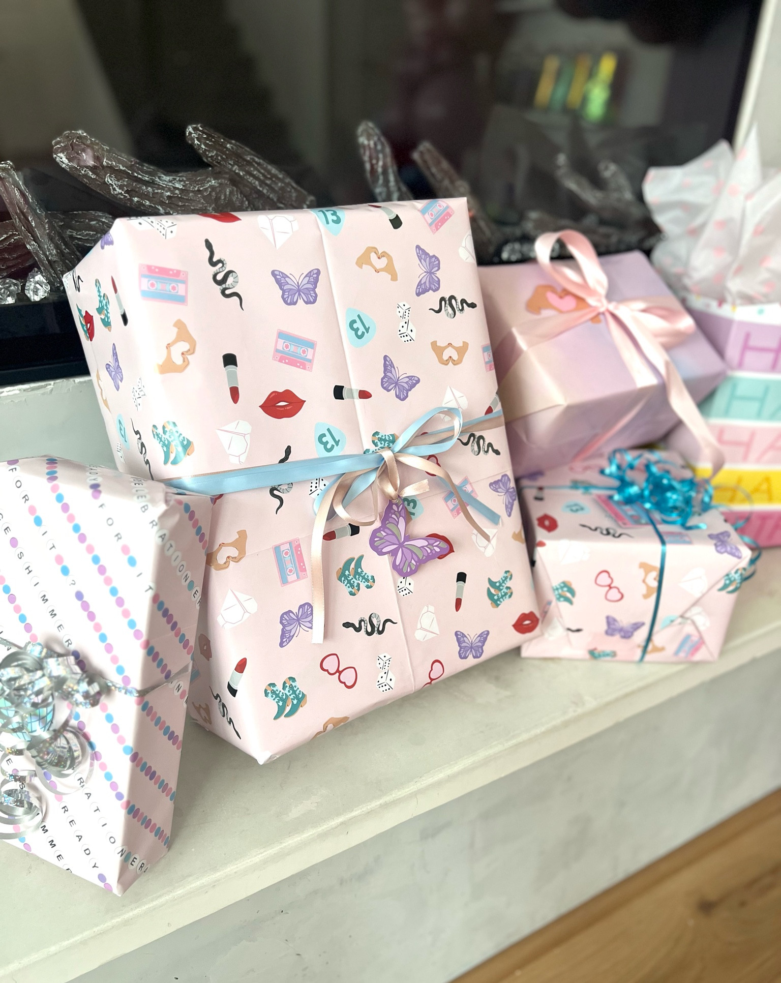 I’m obsessed with this Taylor Swift wrapping paper we found for Jenna’s Bejeweled birthday! 😍🫶🏻 seriously can’t get over all the cute prints and tags and they all coordinate together perfectly for gift wrapping or table runners 💜✨ 

Check out my other posts for more from this party! 

#LTKparties