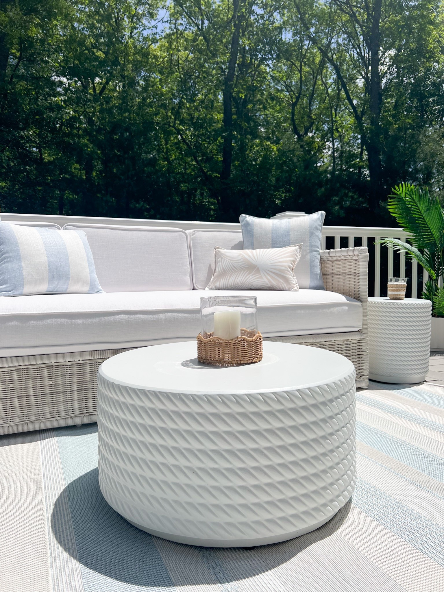 (#ad) We are going into our second summer with this gorgeous outdoor rug, coffee table & coordinating side table from @Wayfair and all of these pieces have held up so well! Plus they are all at an affordable price point!
#Wayfair #WayfairPartner #wishyouwerehere #outdoor  
 - 
coastal home decor, coastal style, outdoor furniture, patio furniture, outdoor furniture, outdoor living, outdoor lounge furniture, beach house furniture, beach house outdoor furniture, lake house furniture, outdoor decor, patio decor, indoor/outdoor rugs, wayfair rugs, outdoor rugs, patio rugs, striped rugs, outdoor coffee table, white coffee table, round coffee tables, outdoor pillows, coastal pillow covers, blue pillow covers, outdoor pillows, waterproof outdoor pillows, home sales, outdoor furniture sales, wayfair sale, outdoor side tables, white side tables, outdoor patio ideas

#LTKSaleAlert #LTKHome #LTKSeasonal