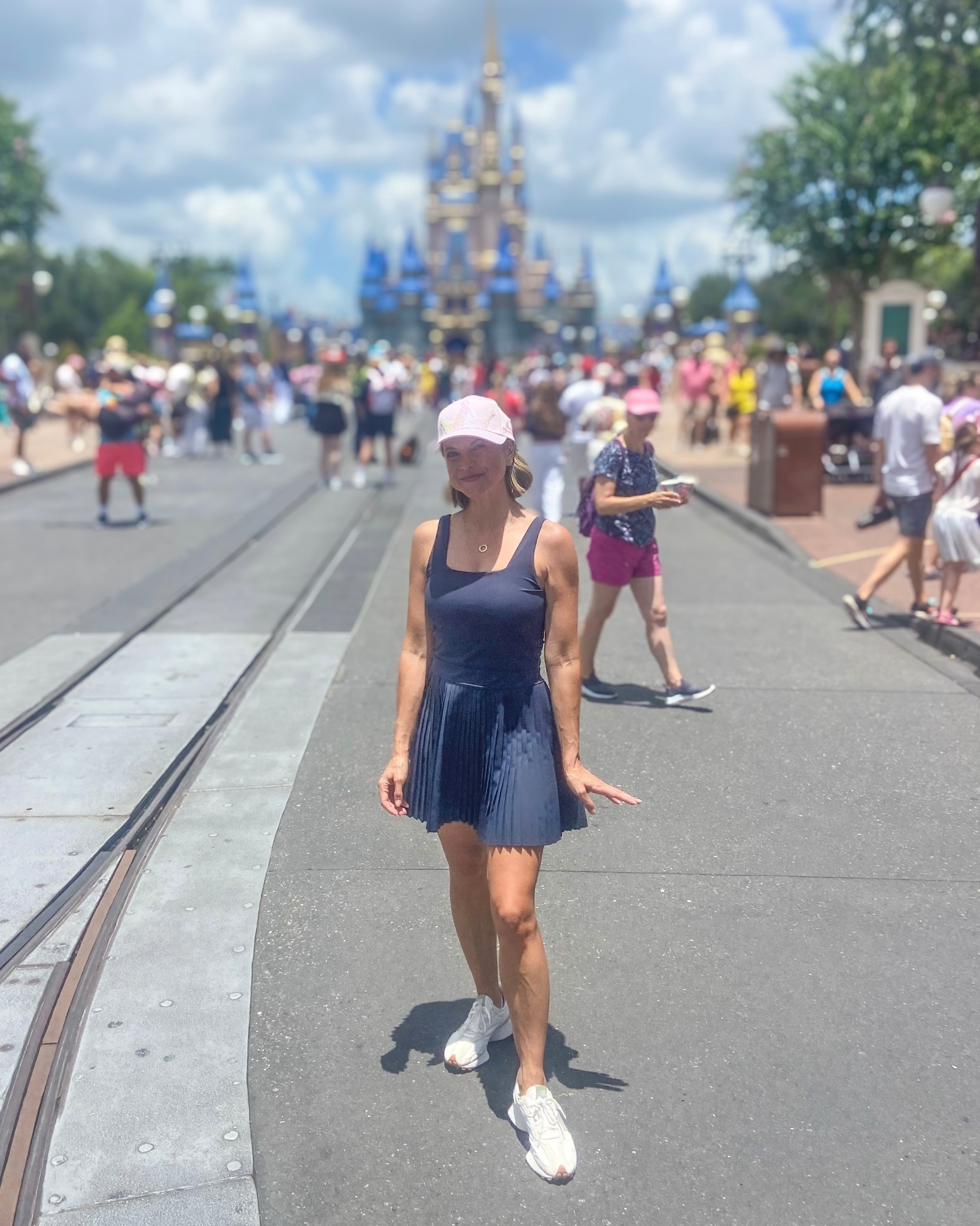 Disney outfit! Target navy active dress with pleated skirt, built-in shorts and sports bra. I got the hat in one of the gift shops on Main Street.

#LTKOver40 #LTKPetite #LTKFindsUnder50