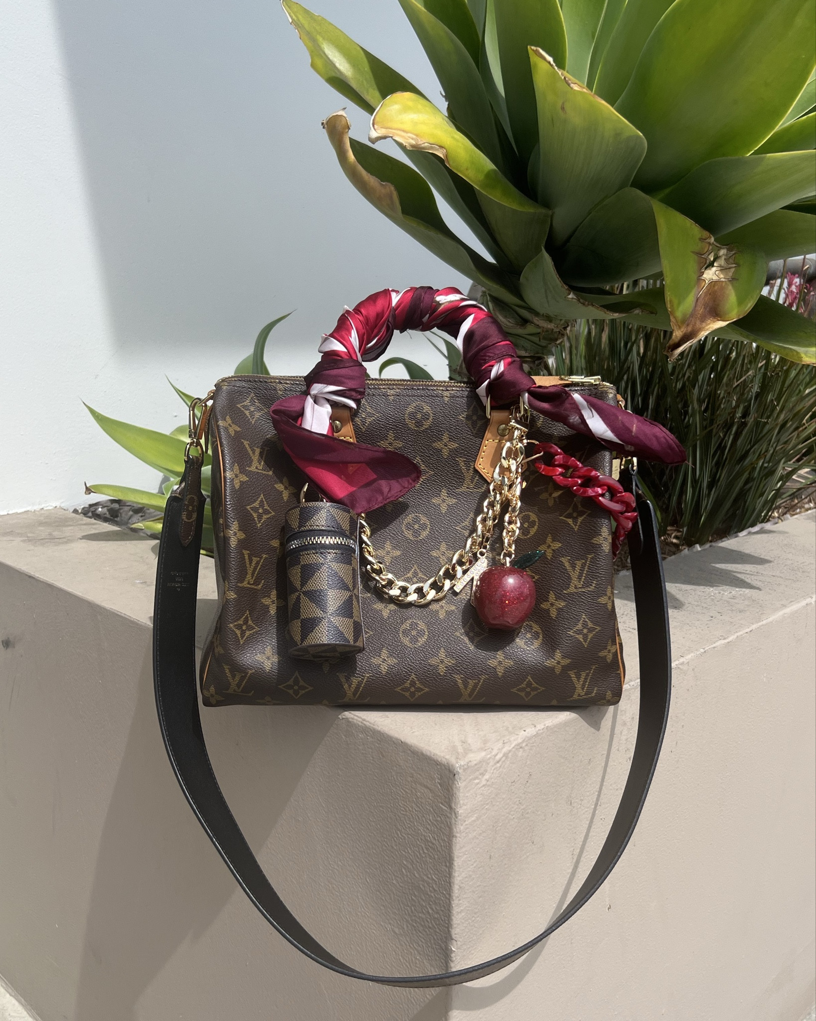 I charmed my bag!
-
Louis Vuitton vintage Speedy 30 bag - vintage purse - LV speedy 30 - bag charms - chunky bag chain - gold bag chain - red bag chain - lipstick pouch bag charm - apple bag charm - bag twilly scarf - denim fitted waist shirt - summer outfit - mom outfit  - everlane pants - fashionphile bag strap - H&M denim shirt - amazon bag charms - amazon bag scarf - Etsy bag chain - Japanese eBay Louis Vuitton speedy bags 

#LTKItBag #LTKPetite #LTKStyleTip #LTKMidsize