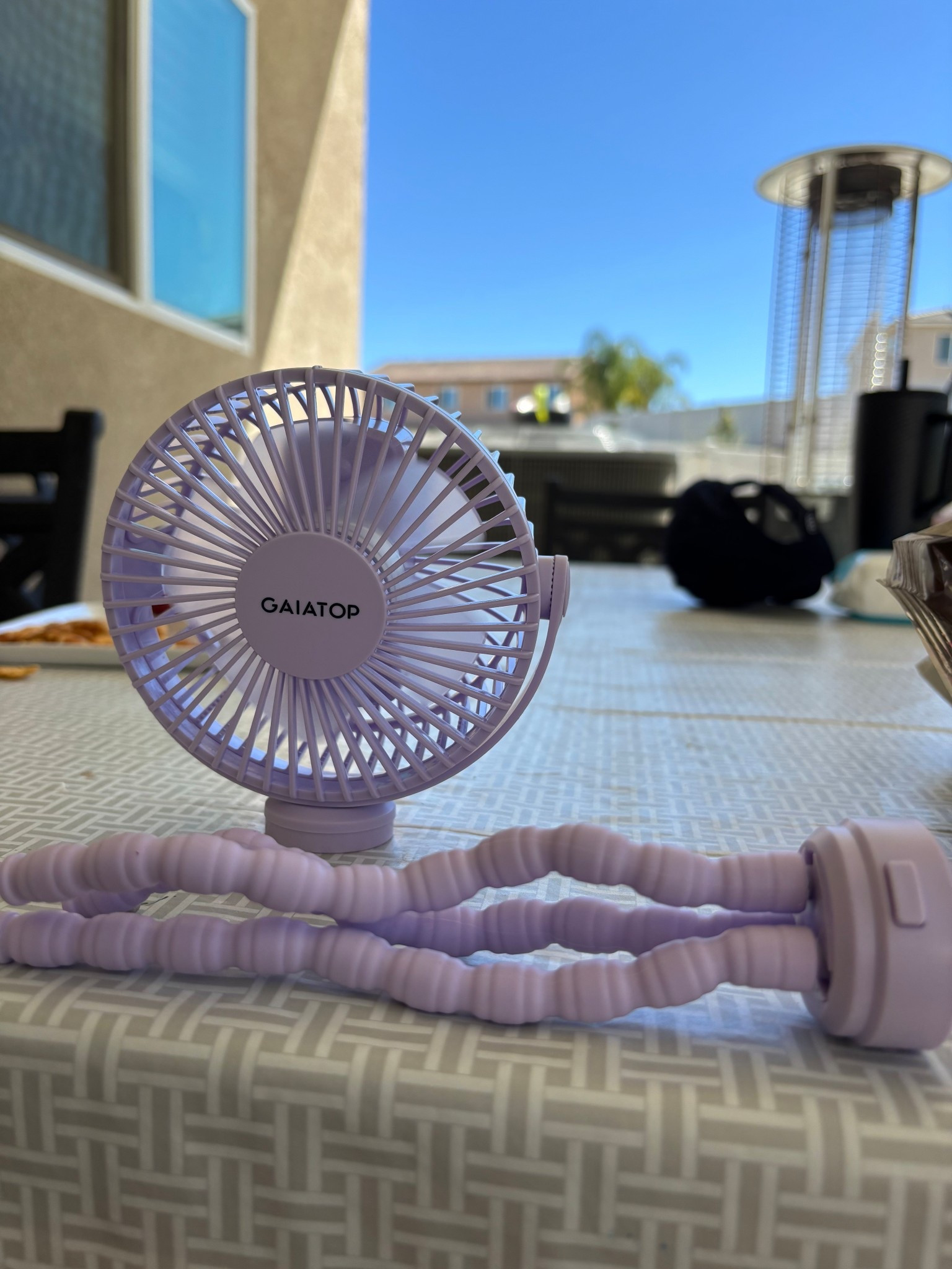 This fan that unsnaps from the legs is so nice! You can leave the legs attached to a stroller to charge it instead of unwinding it since we know they all break. 
I unsnap it so I can set it flat without trying to bend those legs 😂 
A necessity while feeding baby in the backyard  

#LTKmomlife #LTKBaby #LTKBump