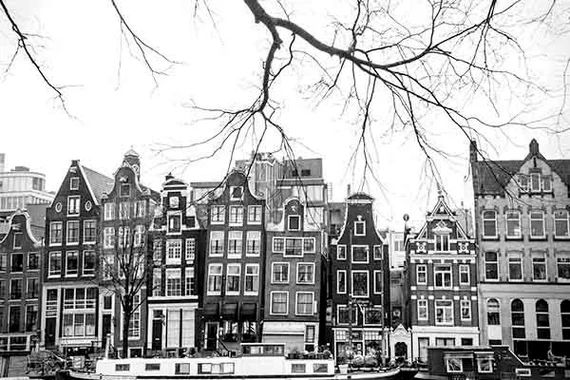 Black and white Amsterdam print featuring unique buildings along a canalTITLE: Quintessential Ams... | Etsy (US)