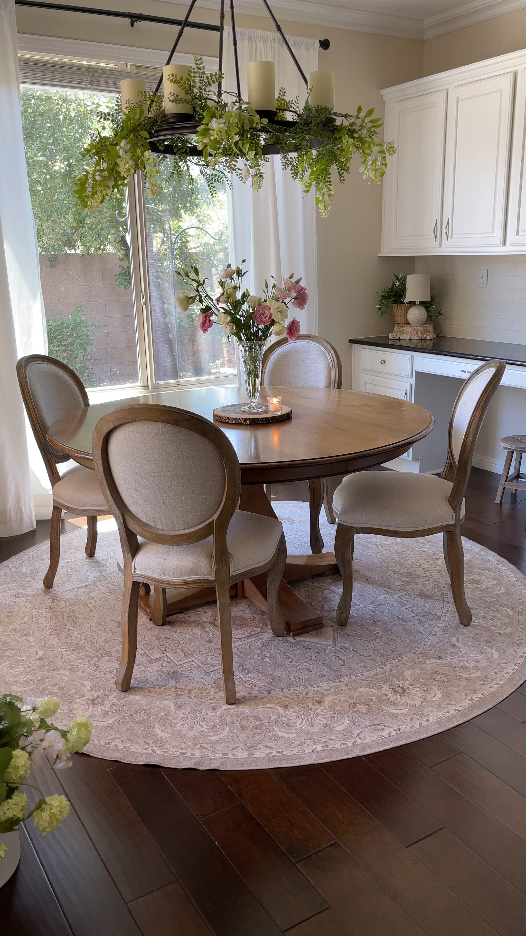 My table is from Ethan Allen, and doesn’t have a link. But I have linked a couple of similar ones.

The chairs are from Arhaus. But they don’t seem to carry them anymore. I’ve linked a similar looking chair below.

Dining room table, round table, kitchen table, French country table, French country chairs, fabric chairs 

#LTKhome 

#LTKVideo