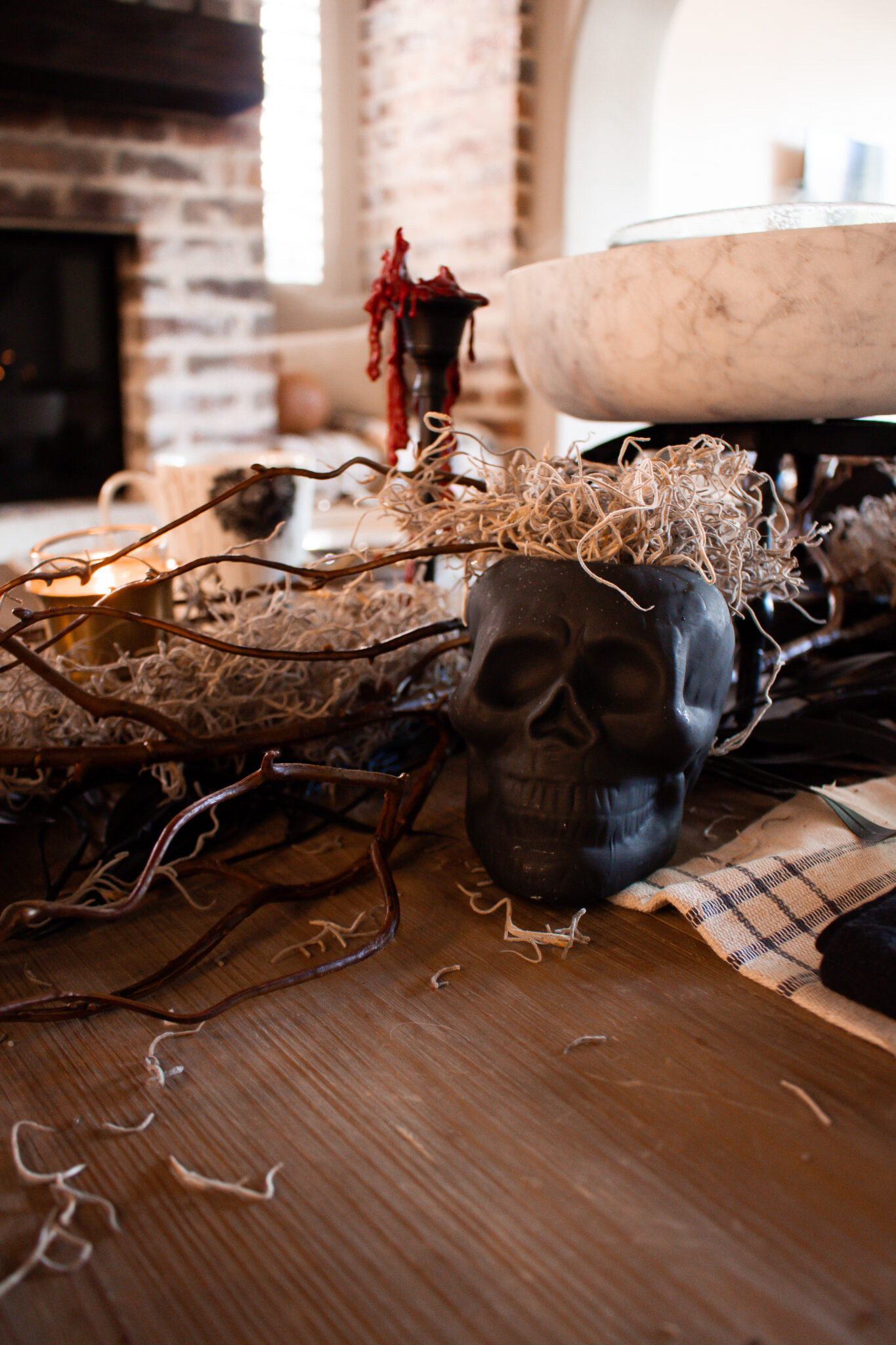 Halloween decor doesn’t have to be over the top to make a statement. 🖤 Keeping this table dark, dramatic, and modern with a few spooky touches mixed in.

#LTKHome #LTKSeasonal