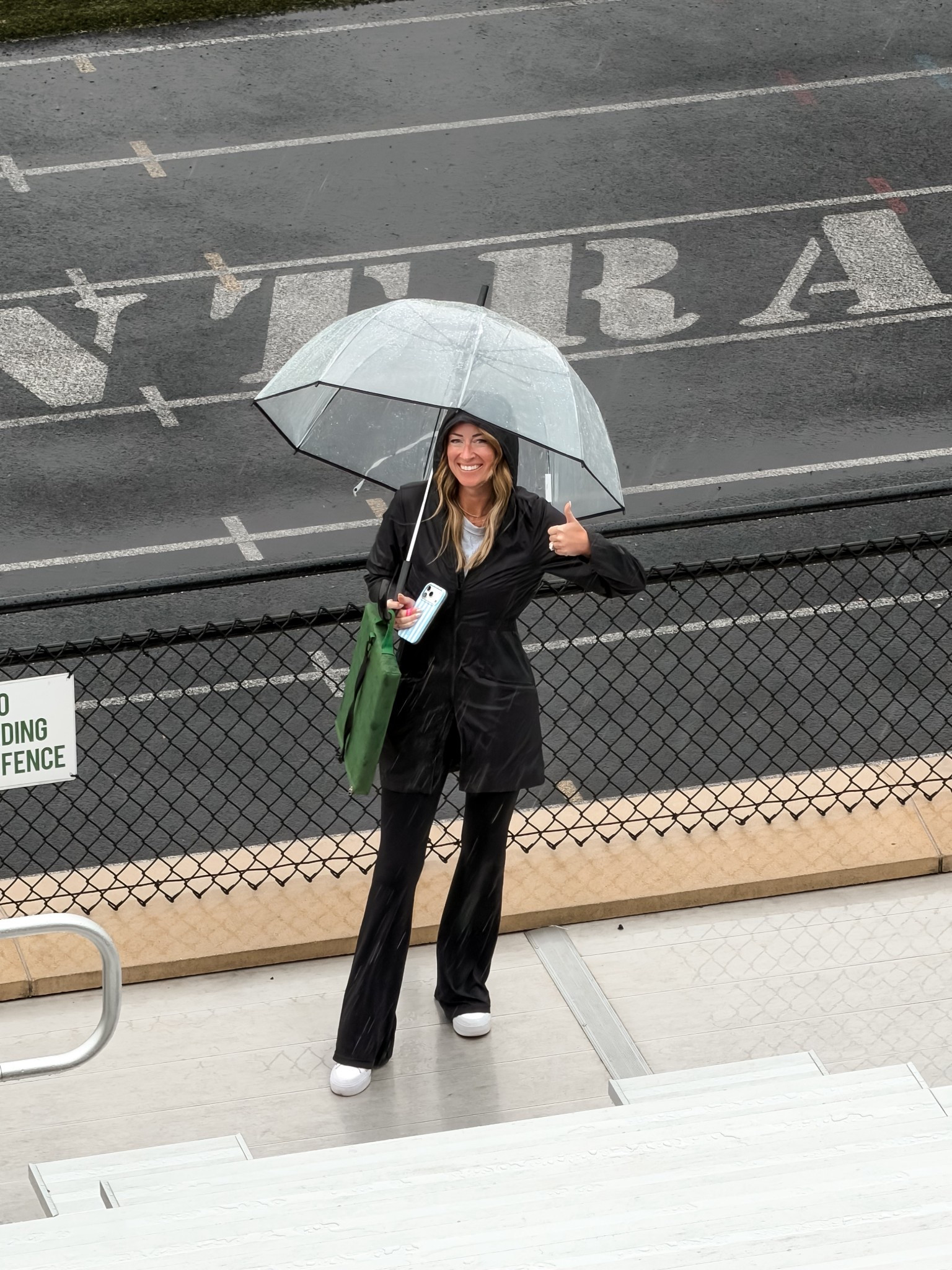 Rainy day soccer mom style
Cold and rain spring season game day sports mom outfit 
Outfits for sports moms 