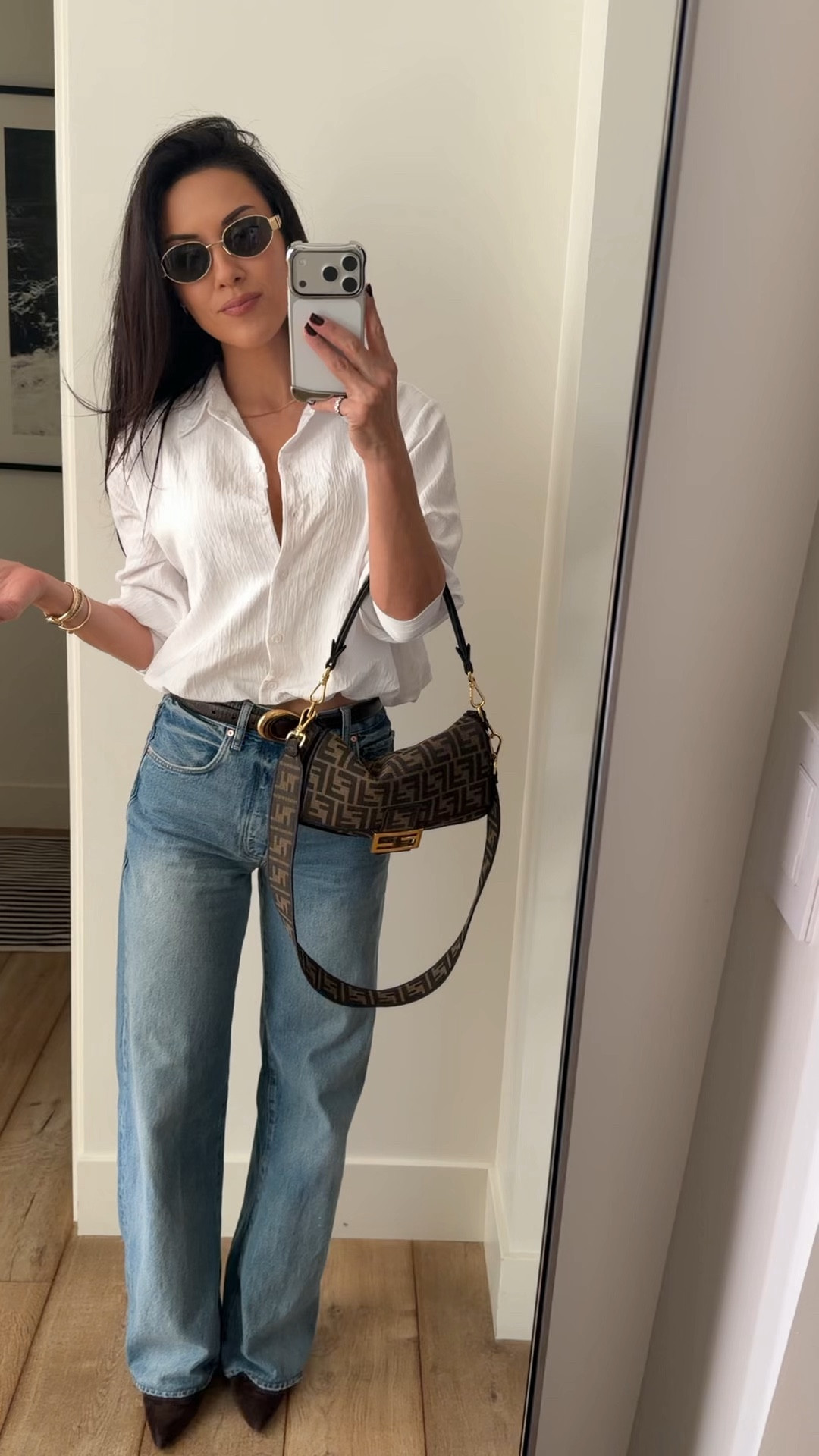Zara has been killing it lately- I’m  loving this bubble hem cropped light weight button down. It’s such an easy one for spring. I’m headed out to lunch so paired it with my favorite slight barrel jeans and a few fun   accessories.

#LTKSpringSale #LTKootd #LTKmomlife