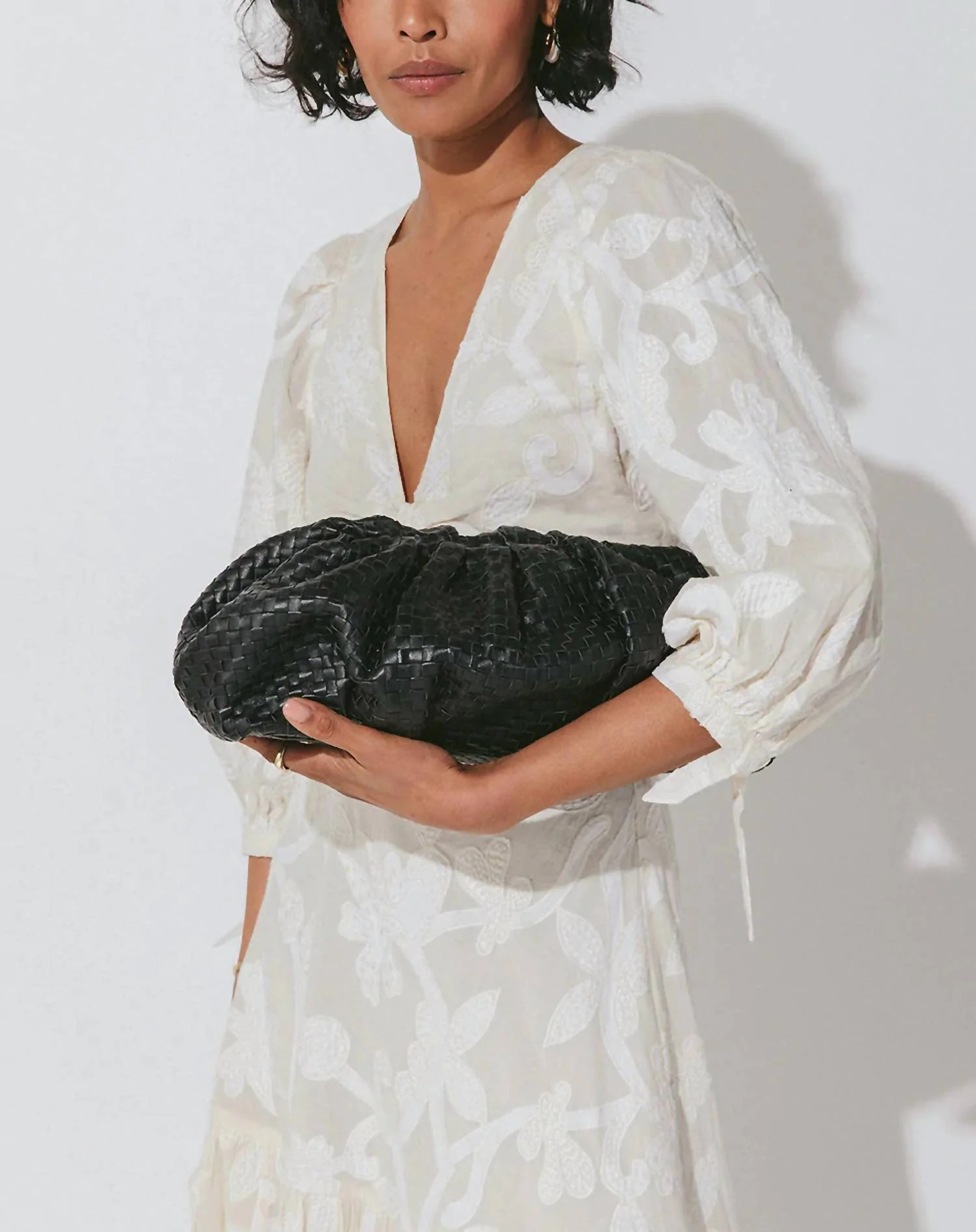 Gigi Woven Clutch In Black | Shop Simon