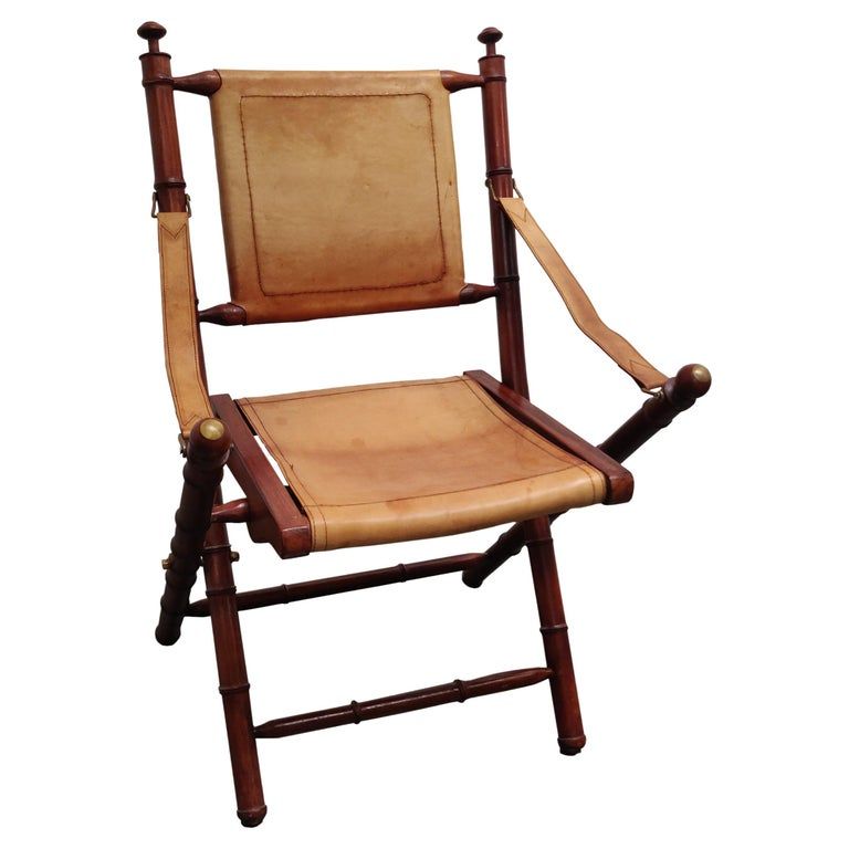 Faux Bamboo and leather folding officer safari chair. | 1stDibs