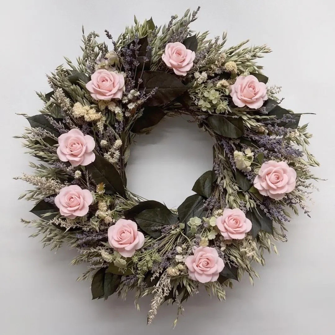 A soft, romantic wreath that feels like a garden in full bloom 🌸 Blush pink paper roses are layered over preserved green salal leaves, with airy avena oats and silvery artemisia adding natural movement. Accents of lavender, kent beauty, and delicate sinuata statice bring a gentle meadow-inspired palette that looks beautiful on an interior wall, pantry, or bedroom. Handcrafted from farm-grown botanicals in the USA, each wreath is a one-of-a-kind piece designed to bring lasting floral beauty indoors.

#ltkhome #driedflowerwreath #romanticdecor #farmhousestyle #cottagecore #lavenderdecor #homedecorinspo #naturaldriedflowers #softdecor #ltkfinds

#LTKSpringSale #LTKHome #LTKSeasonal