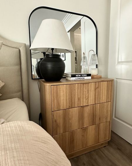 Our bedroom refresh is slowly coming together! I was so incredibly impressed with the quality of this nightstand!! It’s very durable and the drawers are deep which I love! I feel like the mirror adds the perfect warmth to the room and brought the look together .  Details linked below 

#LTKU #LTKStyleTip #LTKHome