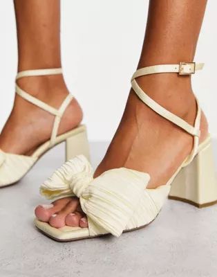 ASOS DESIGN Hitched bow detail mid block heeled sandals in ivory | ASOS (Global)