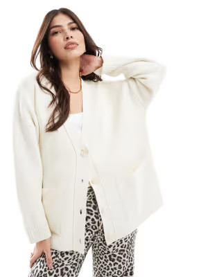 Stradivarius oversized knitted cardigan in ecru | ASOS (Global)