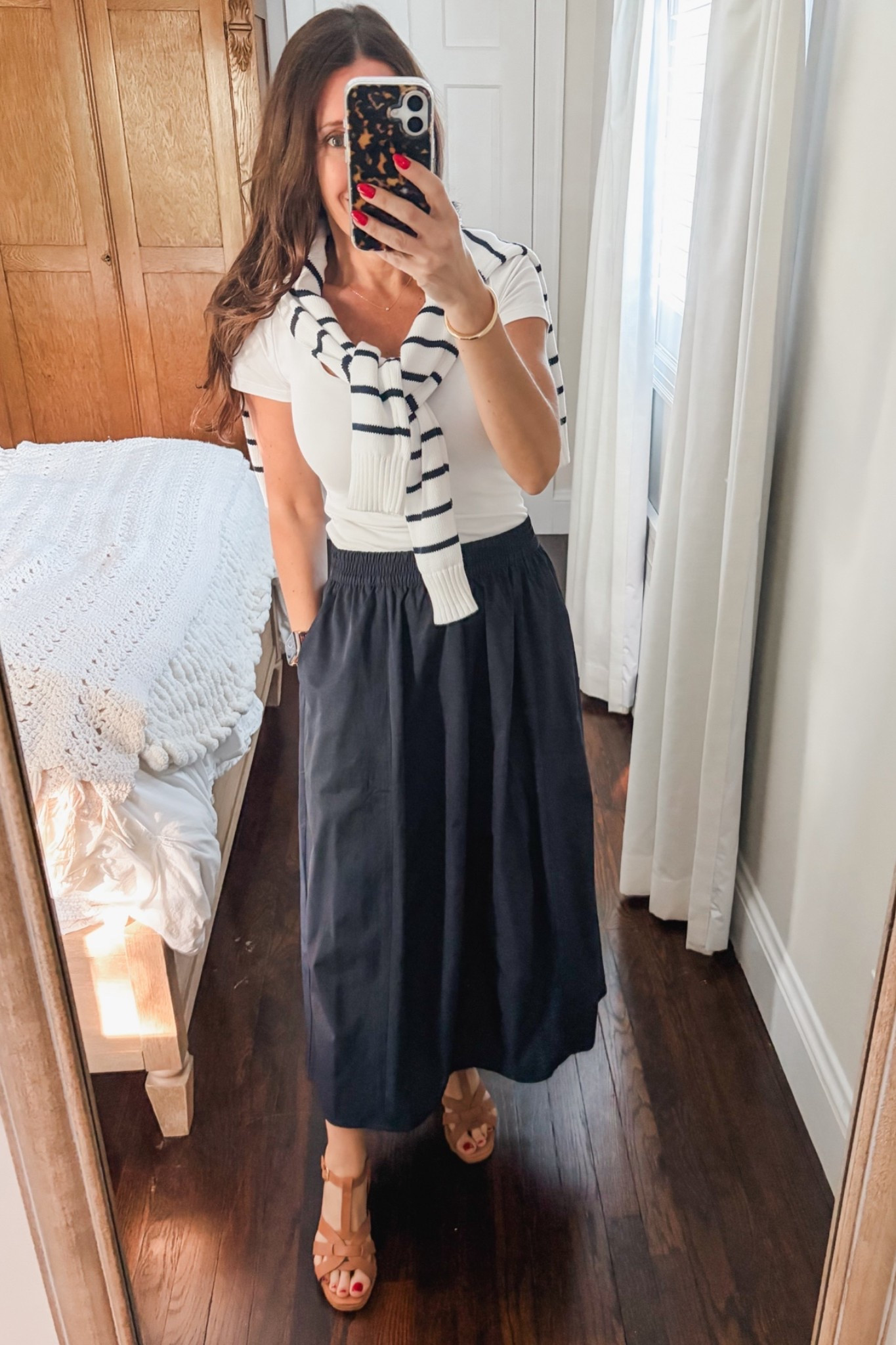Can you believe this skirt is from Target! It looks way more expensive than it was.  I am wearing an xs.  My shirt is from Old Navy, also an xs.  My sweater is Ralph Lauren and is on sale but limited stock.  I am linking similar styles.  The shoes are the most comfortable wedges ever and are worth the $$.  Look designer but are designed by a podiatrist.

#LTKootd #LTKOver40 #LTKSeasonal