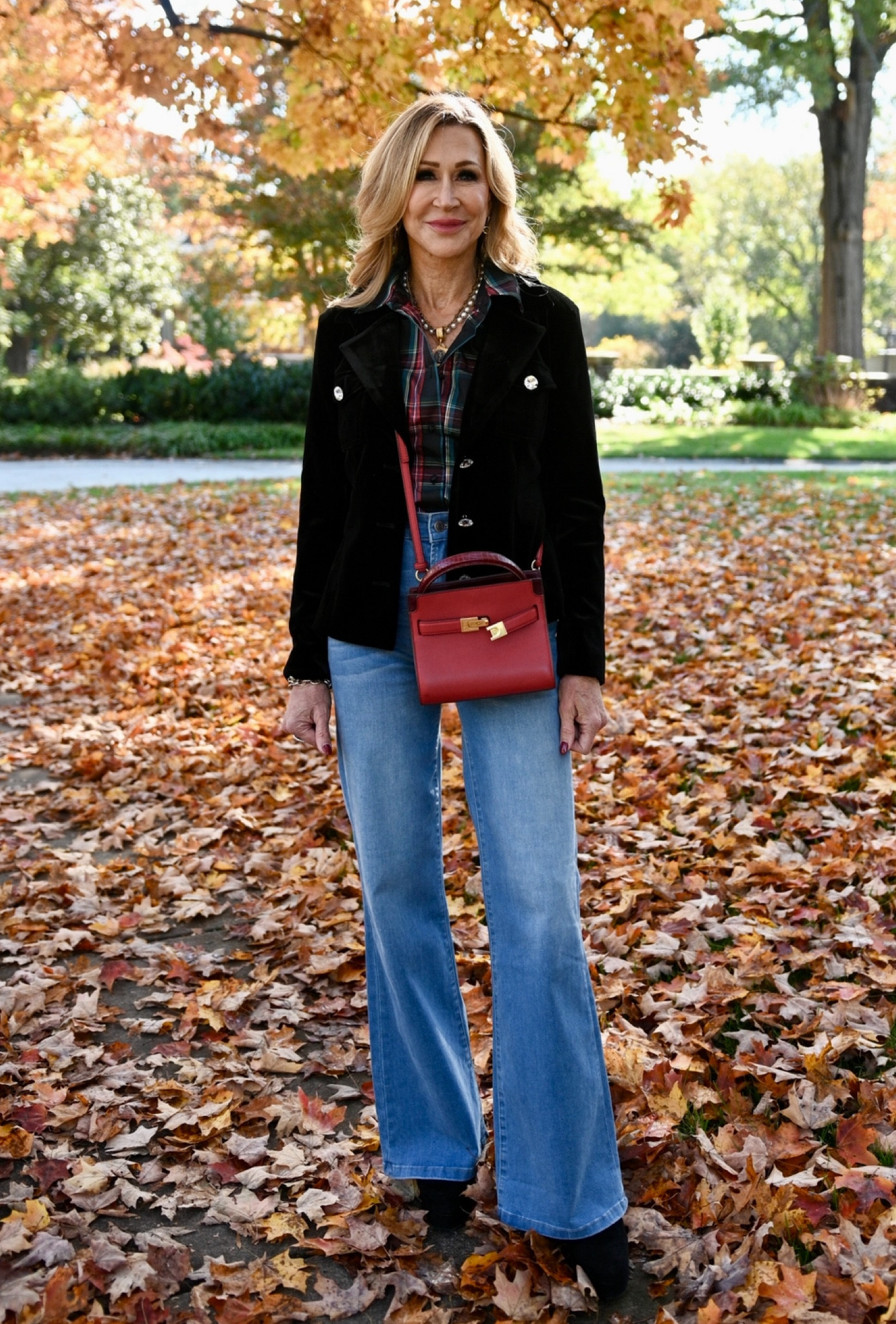Get ready to shine this holiday season!  This look from Boston Proper is relaxed, festive and casual!  A classic plaid blouse, luxe velvet blazer with rhinestone buttons and flare jeans is perfect for casual gatherings!  Add some sparkling earrings, black suede booties (or strappy sandals to be dressier) and a red bag for a pulled together holiday look!


#LTKSeasonal #LTKHoliday #LTKStyleTip