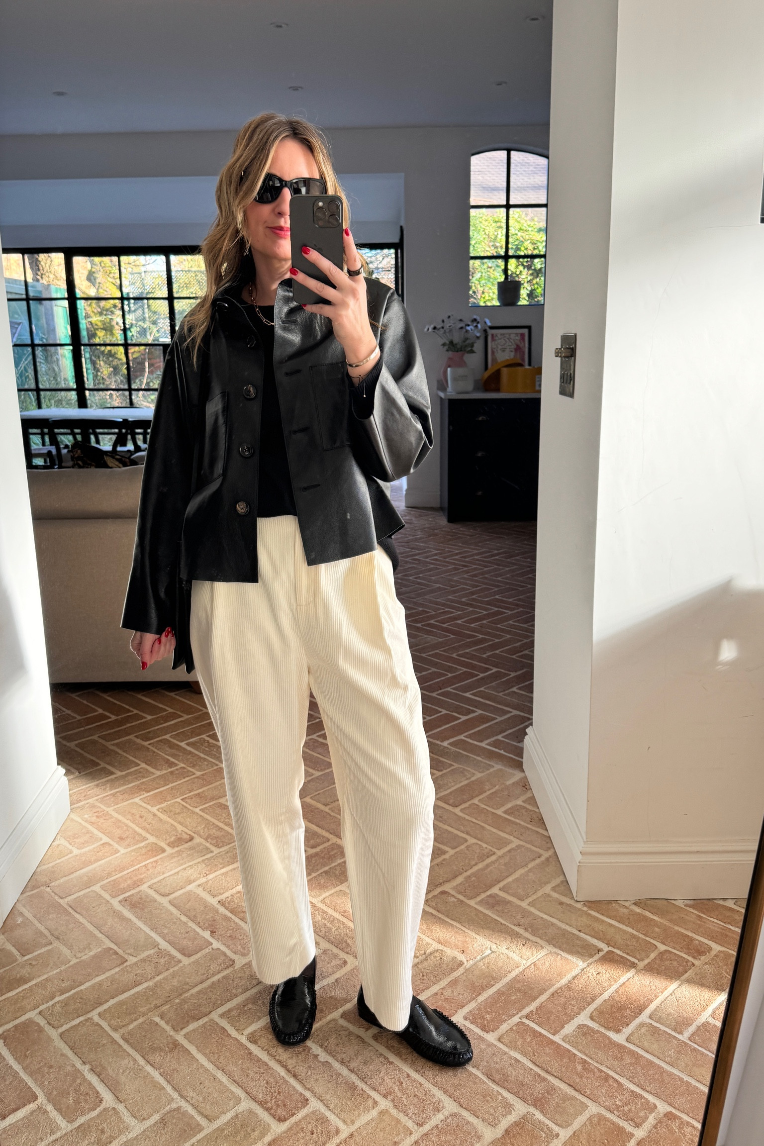 Toteme cream cords + Leather Jacket + Loafers + Arket Bag 

#LTKspring #LTKstyletip #LTKeurope