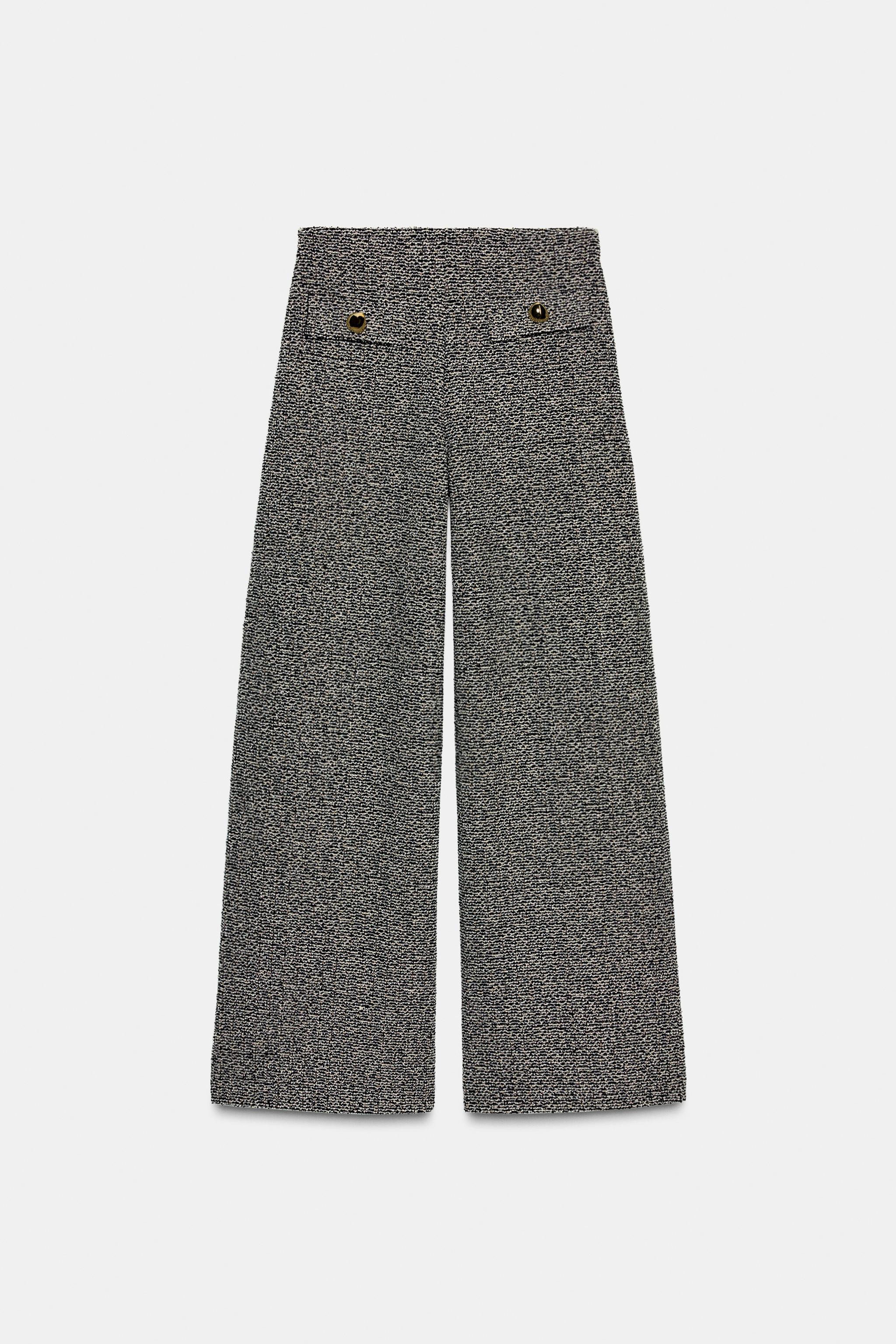 Mid-rise pants with an interior elastic waistband. Faux pockets with metallic buttons on the fron... | Zara US