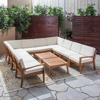 Ajanai Outdoor 12 Piece Sectional Seating Group with Cushions | Wayfair North America