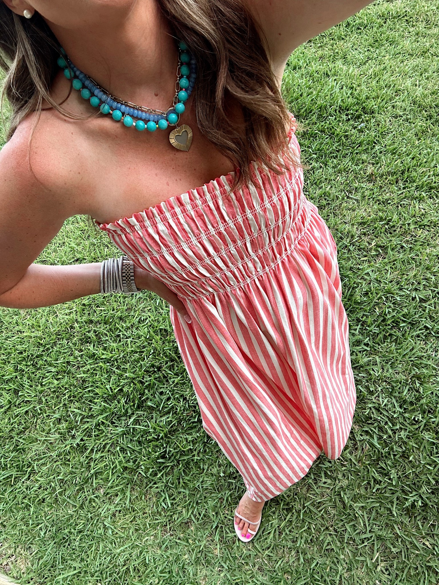 Target beach stripe maxi dress! It’s a soft linen cotton blend! So comfy! Wore it all night for dinner around our condo and the pool! In a size small, fit is tts!