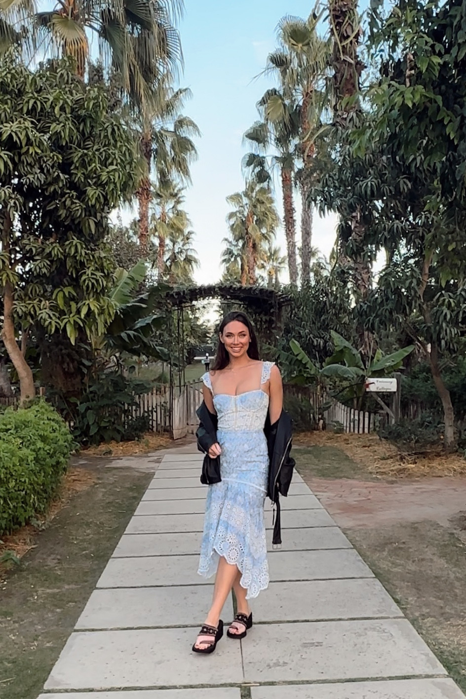 I am obsessed with this blue floral dress from Karina Grimaldi. I rush ordered it from FashionPass for a last minute trip to Cabo San Lucas with some friends. I wanted something fresh and fun that I could wear to Flora Farms, a lovely farm to table restaurant in Cabo. I love the patterned eyelet fabric of this dress and the cut is so flattering. Usually bustier style things don’t fit my tatas, but this fit perfectly. I got it in a Medium. Paired it with my beaded heeled sandals from Rocketdog and a black leather All Saints jacket  

#LTKtravel #LTKSeasonal #LTKwedding