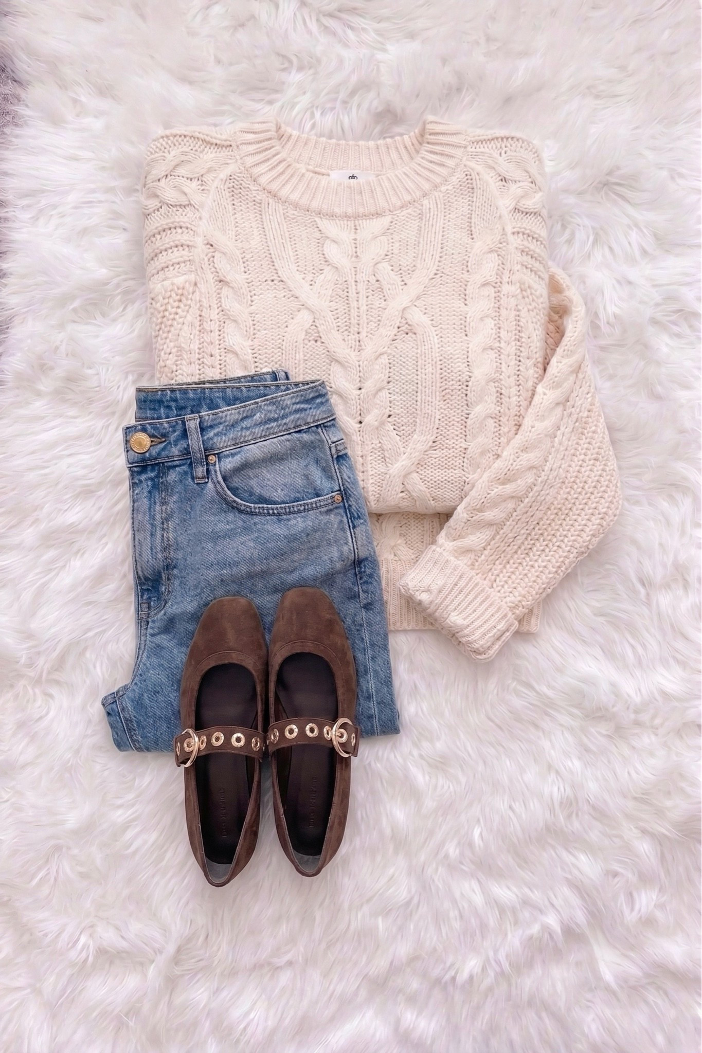The easiest fall outfit to throw on and go. A cable knit sweater, great denim and some chocolate brown flats!

#LTKSeasonal #LTKOver40 #LTKmomlife