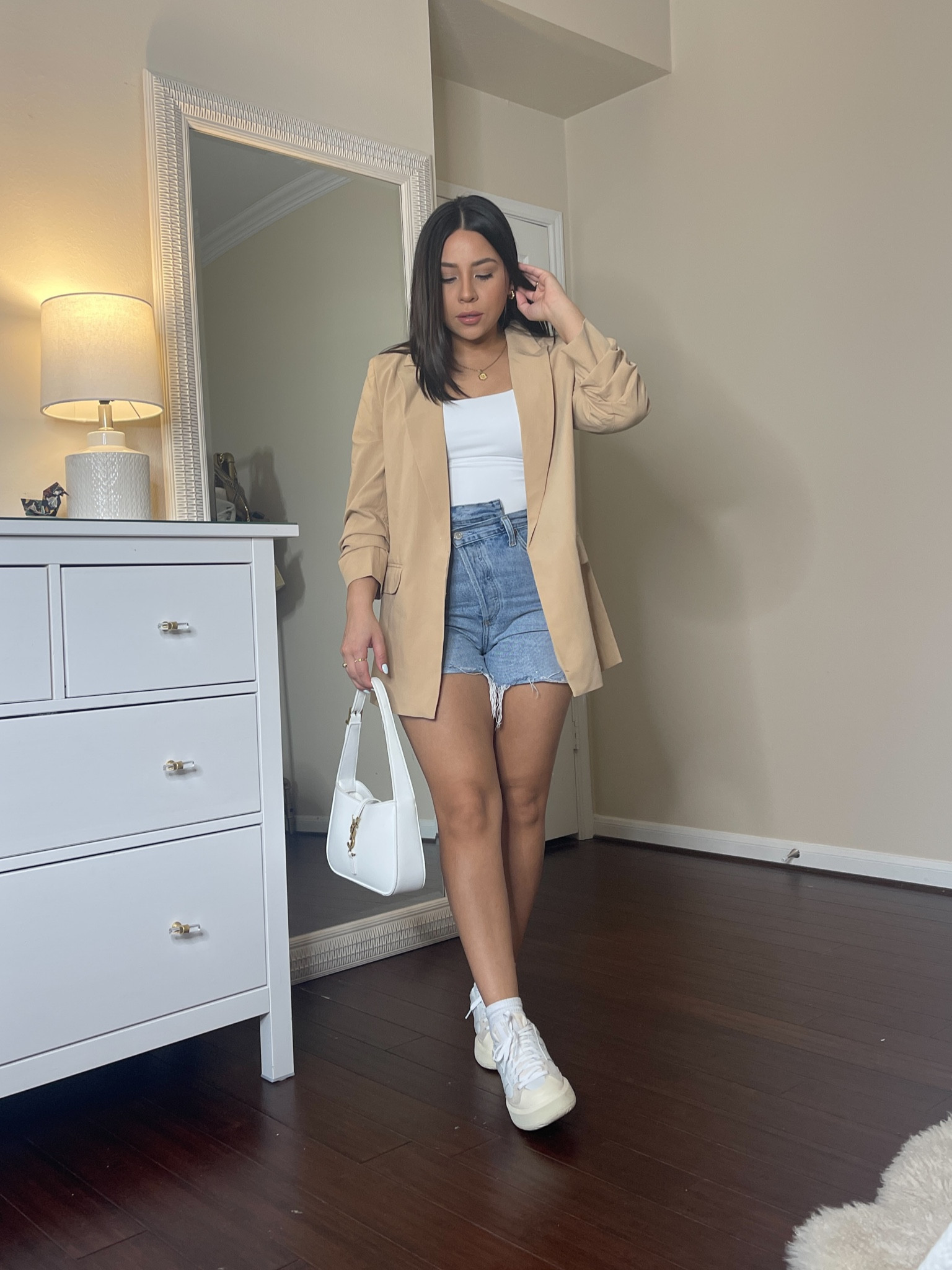 Casual outfit idea 
Khaki blazer: small
White tank: small
Agolde shorts: 25 
New balance sneakers: 4.5 men 
White shoulder bag 
Gold jewelry 

#LTKshoecrush #LTKstyletip #LTKSeasonal