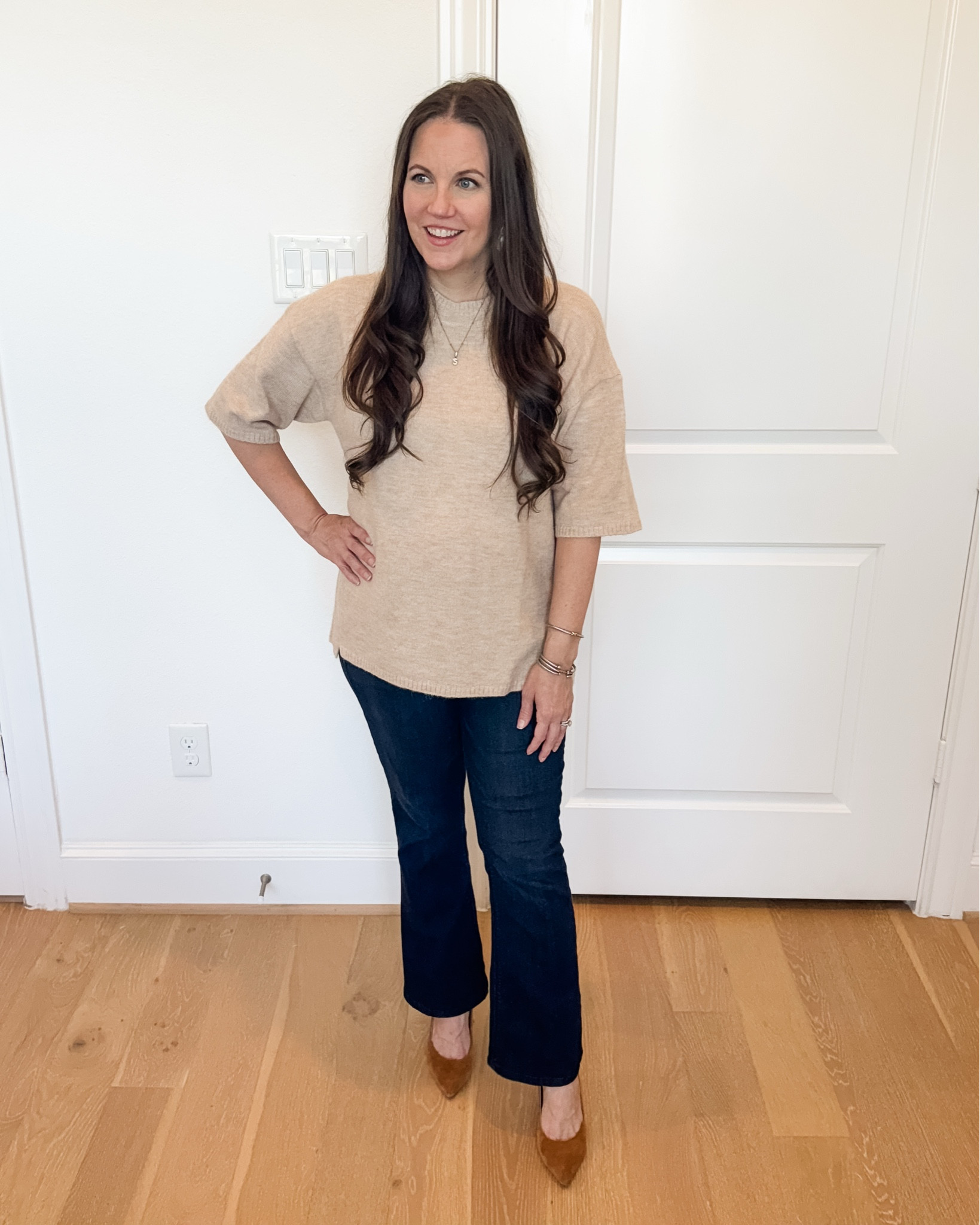 This look is giving classic, polished preppy fall vibes. The light tan brown short sleeve sweater and beige knit top combo feels so cozy while still working for warm fall outfits. Styled with dark blue bootcut jeans, brown heels, and an initial necklace for an easy, everyday casual fall outfit that transitions perfectly into winter outfits too.
Shop the look below 🤎


#LTKSeasonal #LTKWorkwear #LTKPetite