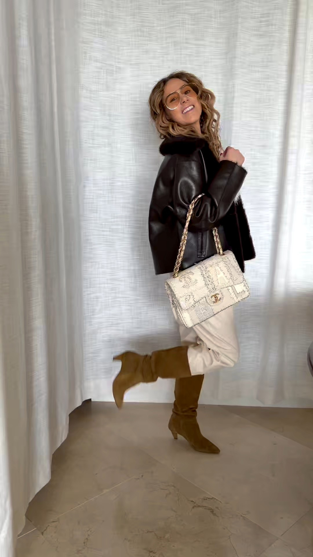 Winter outfit. Outfit of the day. Winter in Florida. Brown faux leather jacket with fur. Beige faux leather pants. Slouchy boots. Chanel bag from FASHIONPHILE  