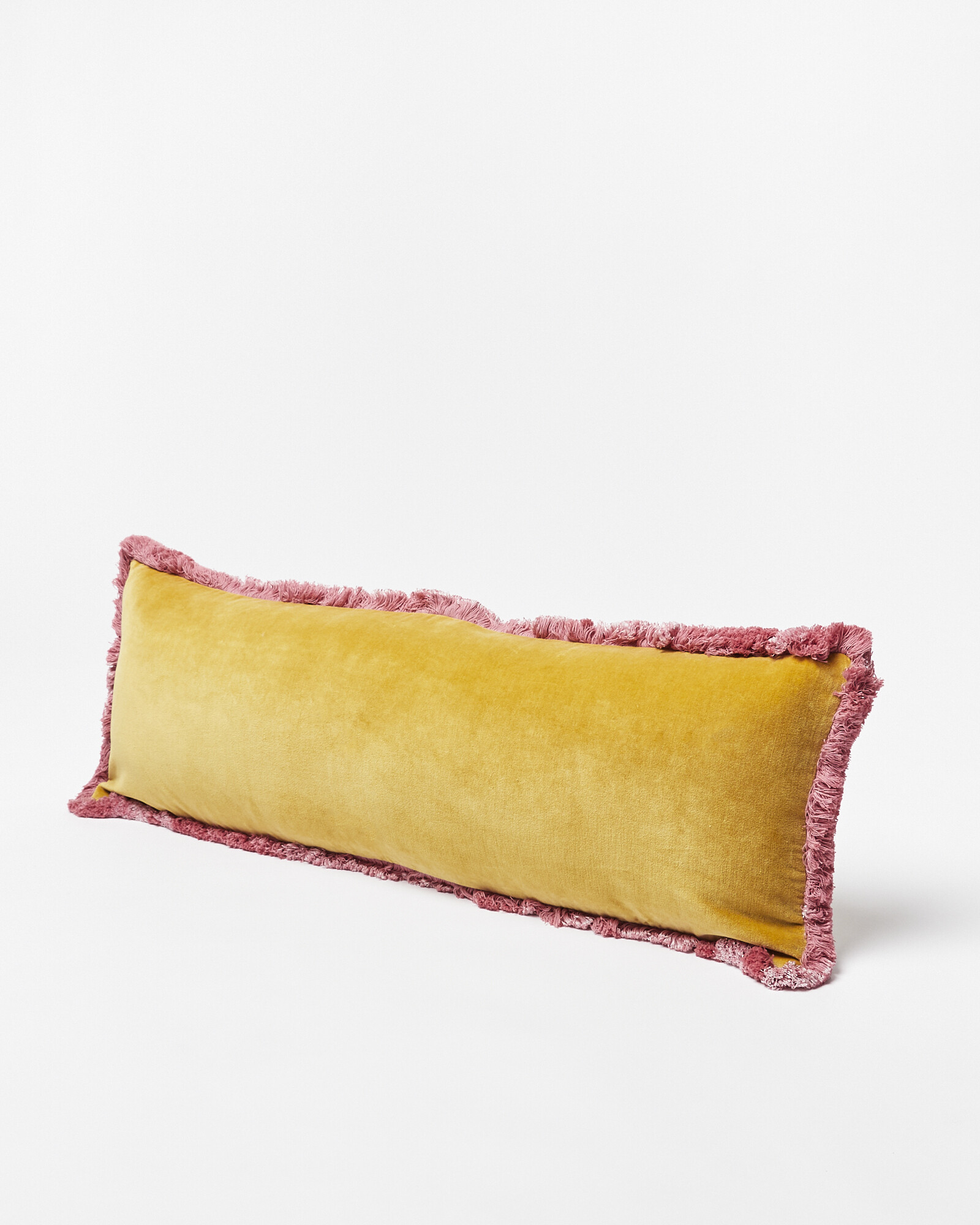 Issey Pink Velvet Fringed Bolster Cushion Cover | Oliver Bonas | Oliver Bonas (Global)