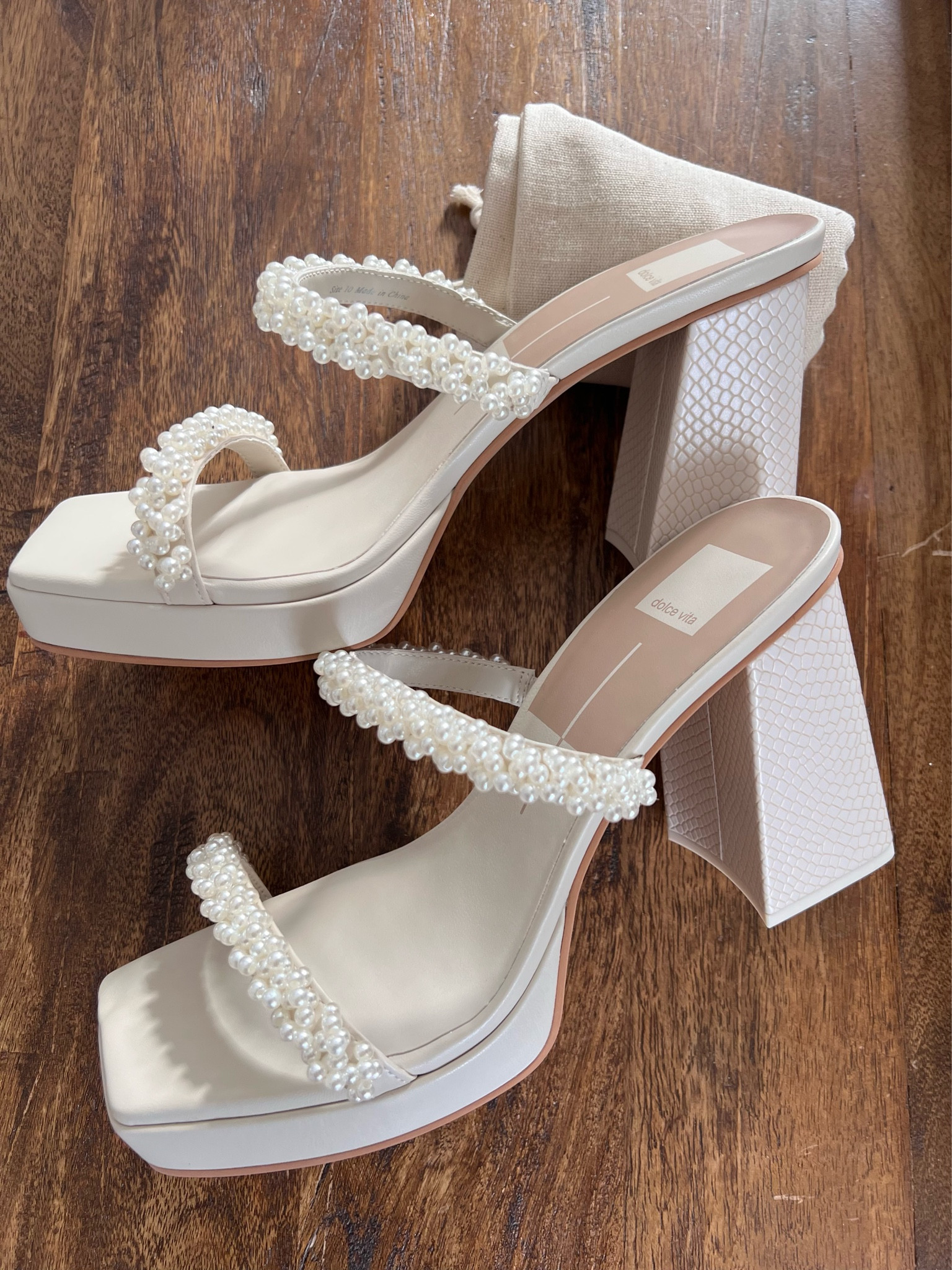Dolce Vita Arielle heels in color vanilla pearls 🤍 delicate pearl straps and a chunky 3.5” heel make it the perfect shoe. 

#LTKwedding #LTKFind #LTKshoecrush