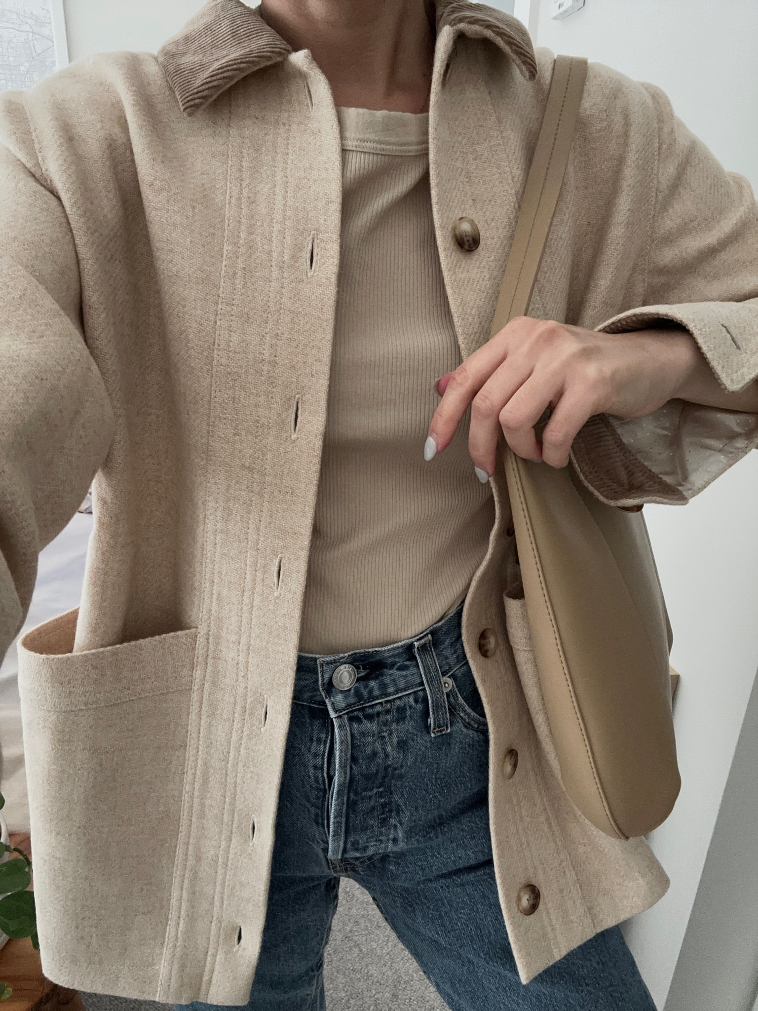 Sezane will jacket. I’m in xs but will be exchanging for s so I have more room to layer  