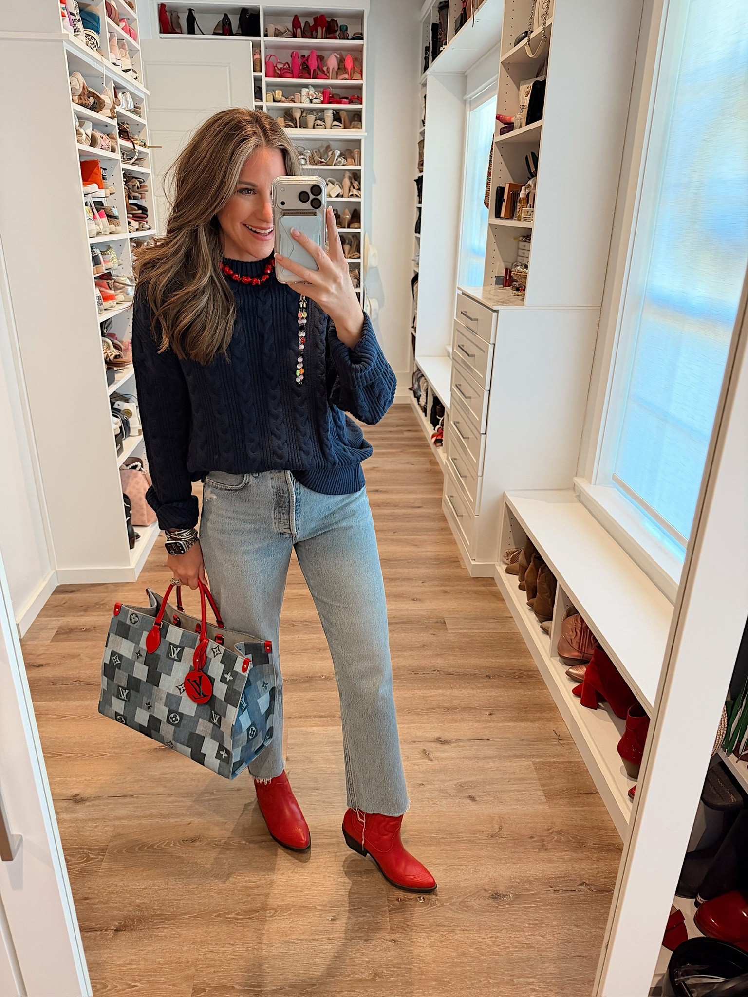 In a medium cable knit sweater, size 8 jeans, boots, necklace and accessories - fits tts.

#LTKootd #LTKSeasonal #LTKFindsUnder50