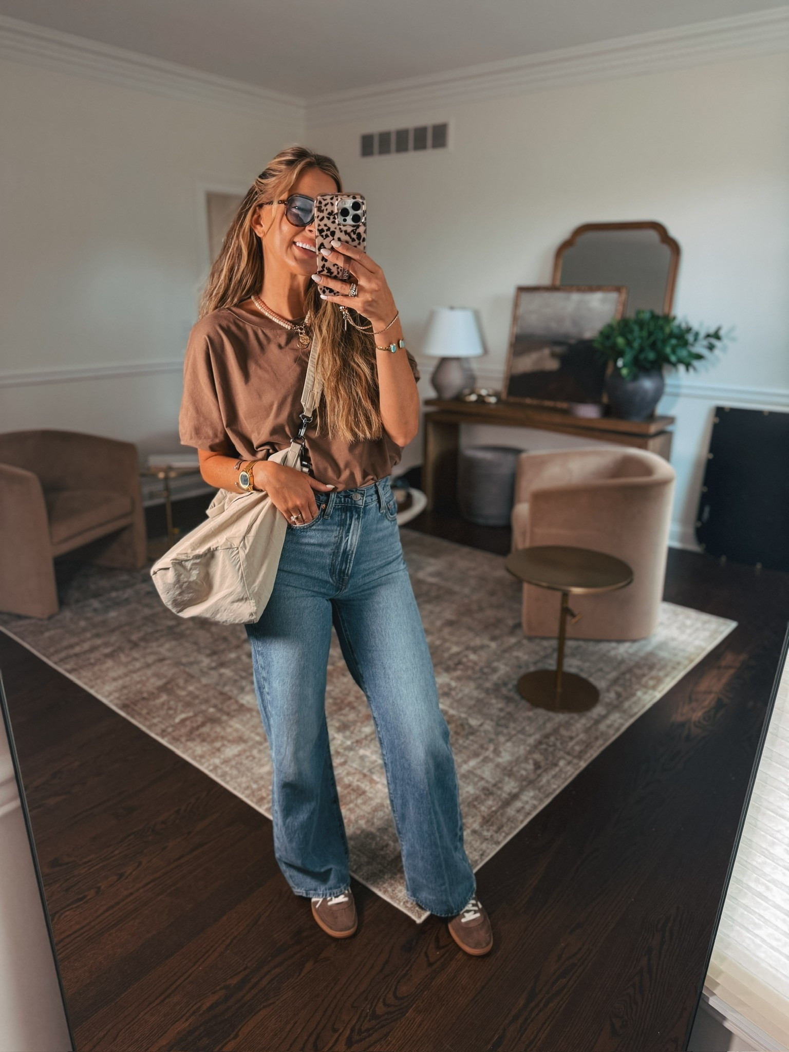 Casual late summer/early fall outfit idea, trending jeans, bubble hem top, summer tops, fall tops, fall bag, fall purse, mom outfit.

#LTKgrwm #LTKootd #LTKmomlife