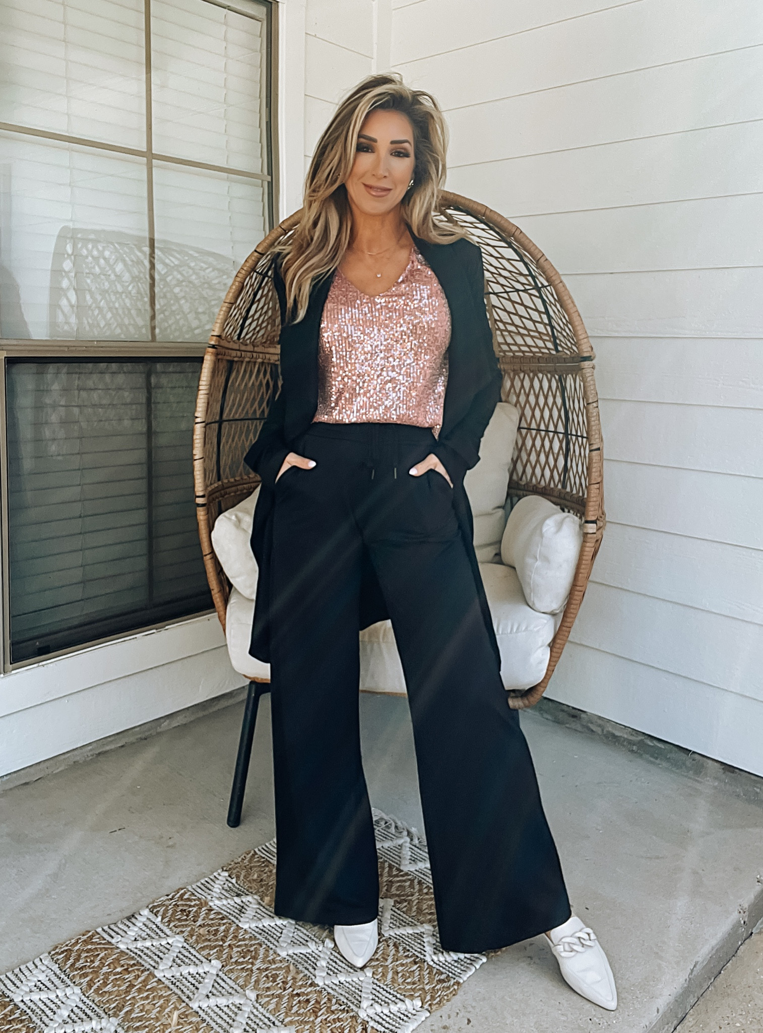 Valentine’s Day outfit, workwear business casual, pink sequin sleeveless top, black knit drawstring wide leg pants, black wide collar belted cardigan, off white mules slides

#LTKover40 #LTKstyletip #LTKworkwear