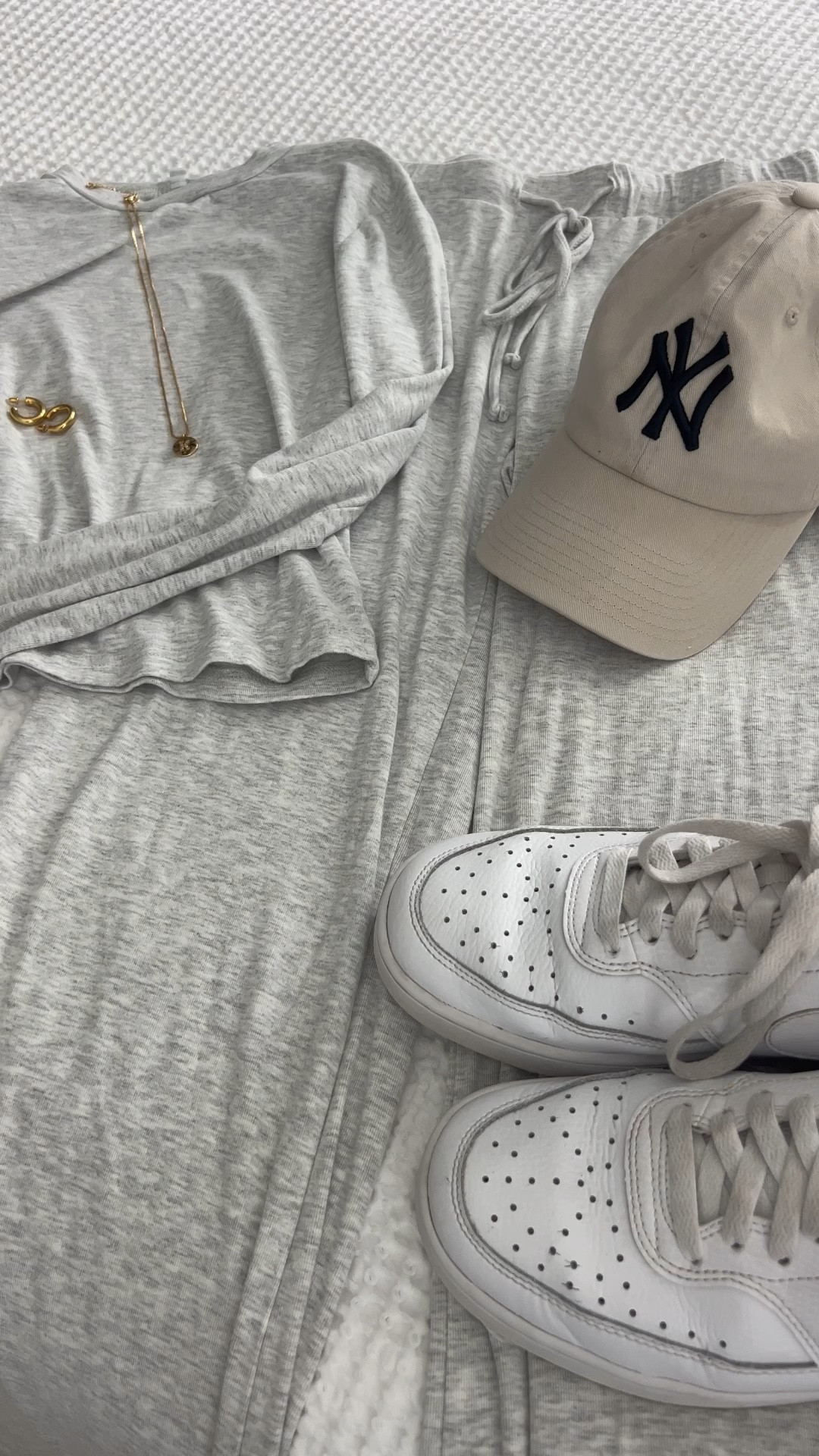 Keeping it cool and casual in this light grey matching set sneakers, a laid back hat, and just the right gold touches to elevate the look 🍒 Perfect for those easy days with effortless style. #LTKStyle #CasualChic #EverydayEssentials

#LTKFindsUnder50 #LTKSaleAlert #LTKShoeCrush