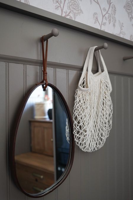 Pegs for a drop zone, mudroom, entryway, laundry room. Bags for extra socks, or groceries and a cute little hanging mirror to check yourself as you leave the room!

#LTKhome #LTKfamily