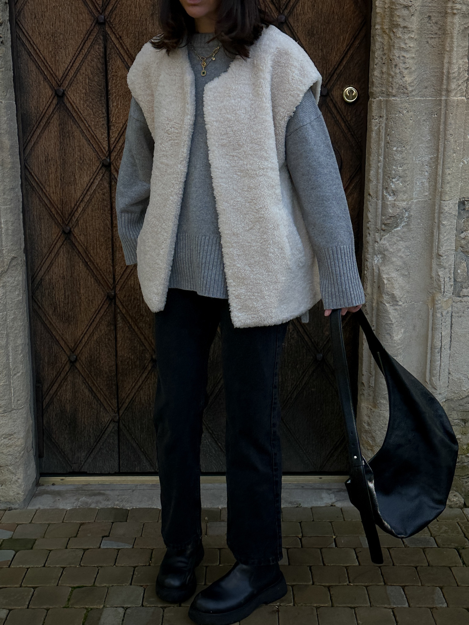Grey knit jumper, wool gilet, black jeans, boots, leather bag

#LTKSeasonal #LTKeurope #LTKstyletip