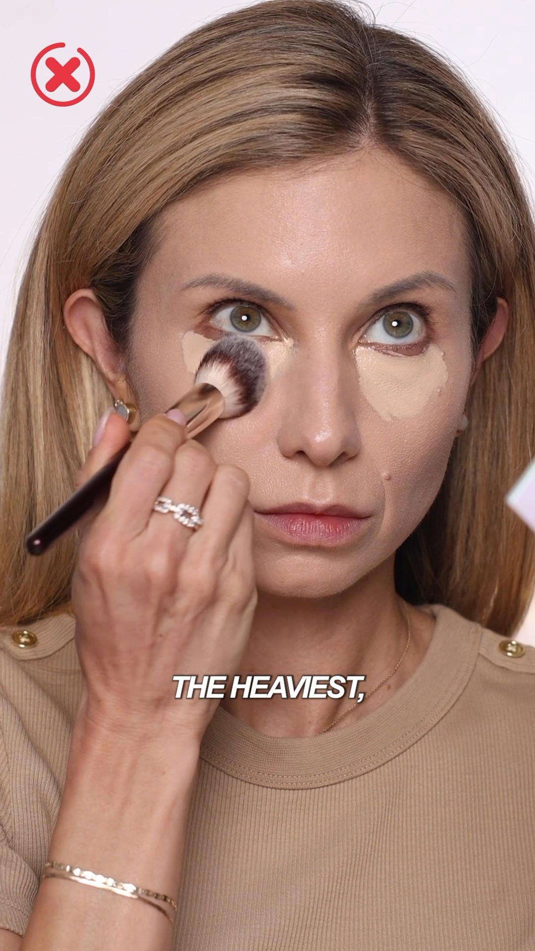 The biggest mistake I see (and make myself sometimes!) is applying way too much under the eyes. Concealer is already the heaviest, most pigmented product in your routine, so a tiny bit goes a long way.

Here’s my concealer hack for smooth, crease-free under-eyes:

Work the concealer onto the back of your hand first, then pick it up with a brush.

Apply just a dot in the inner + outer corners and blend outward.

Always finish by tapping with a clean brush or finger to absorb excess before setting with powder.

💄 Products I used here:

Sarah Creal Face Flex Concealer & Complexion Enhancer

BK Beauty x Angie Hot & Flashy A506 Concealer Brush

✨ This combo = natural coverage, no creasing, no “extra lines.”

#LTKBeauty #LTKOver40